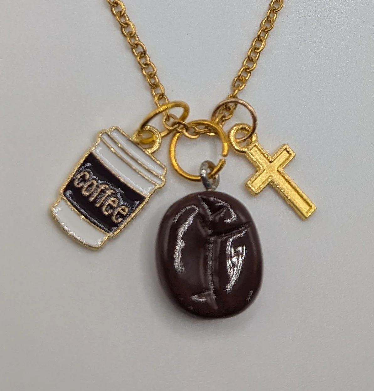 coffee and Jesus with bean on gold chain.jpg