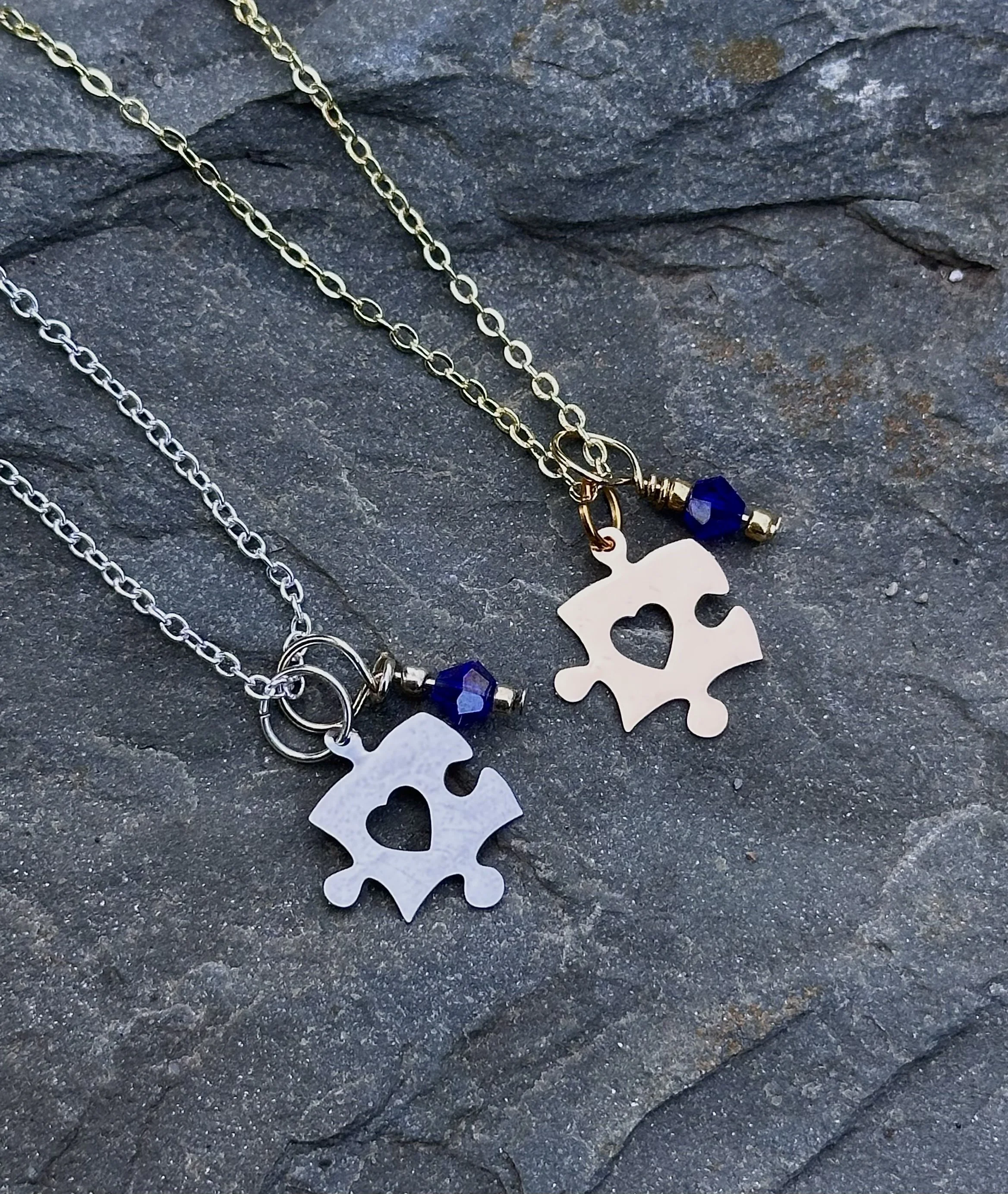 gold and silver puzzle necklaces.jpeg