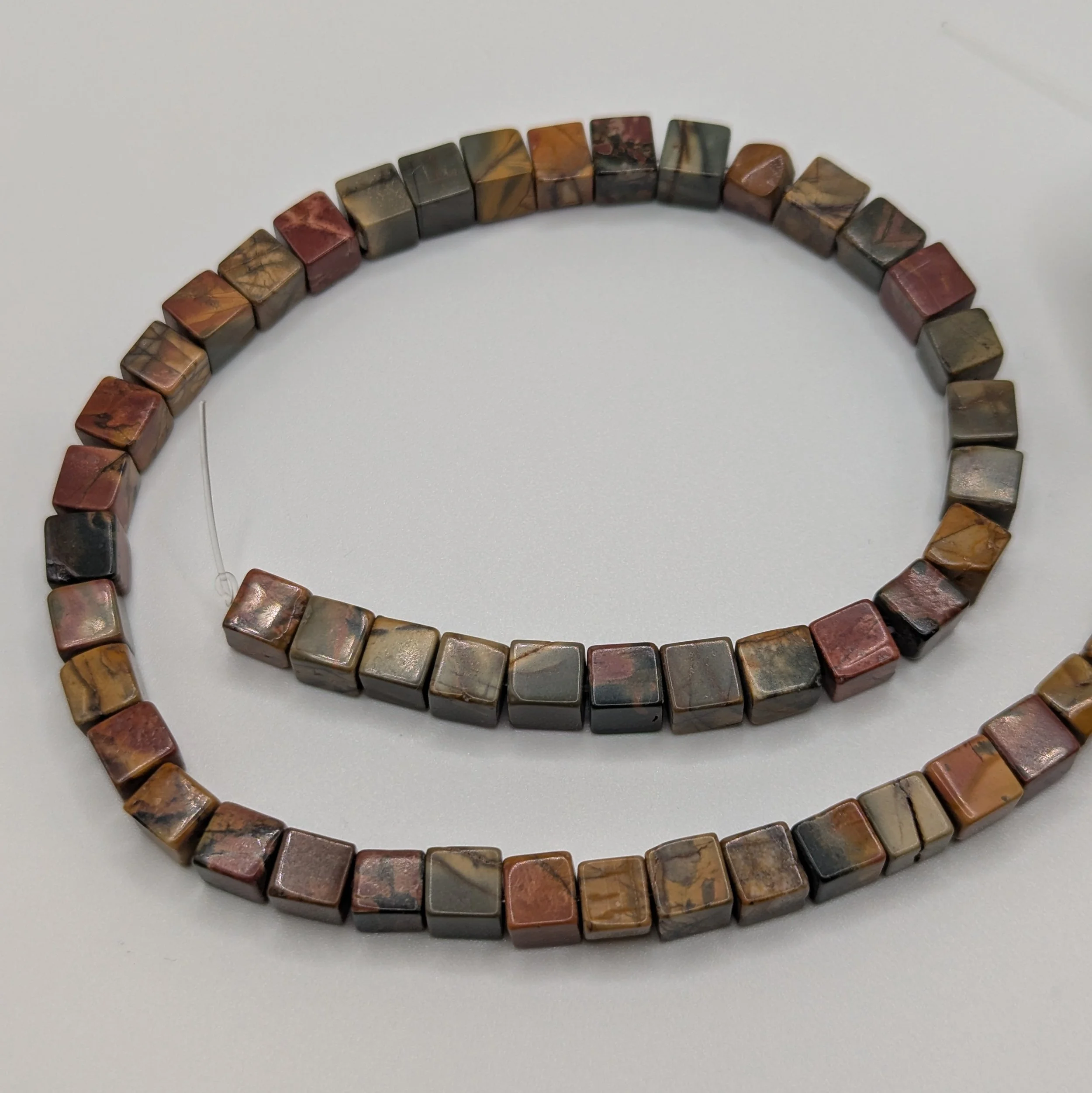 Red Creek Jasper strand.jpg