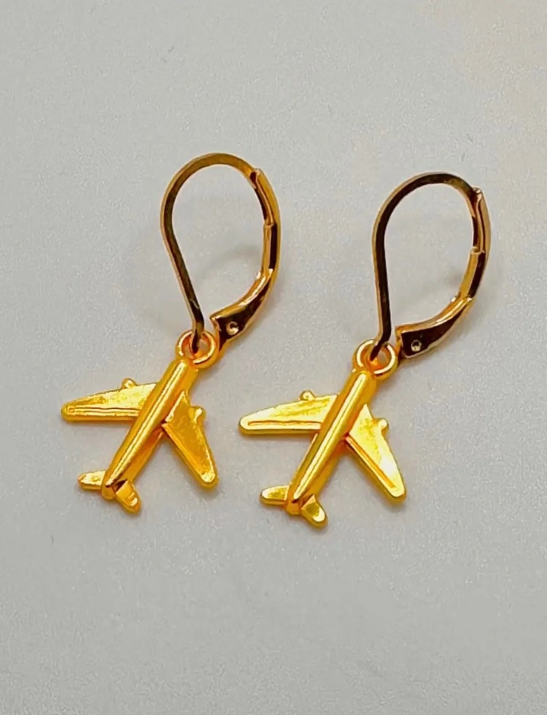 S&S plane earrings.jpg