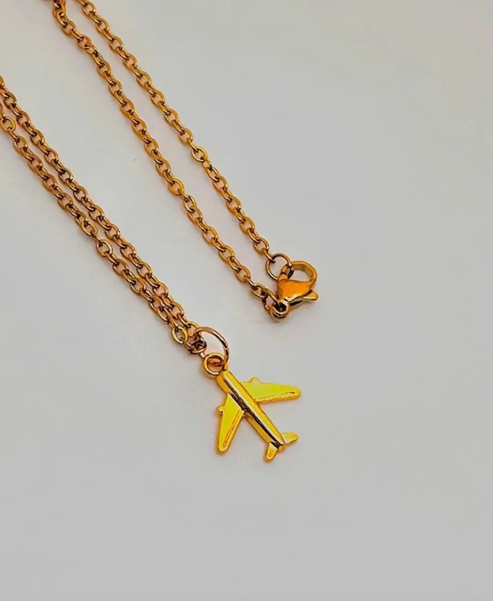 S&S plane necklace.jpg