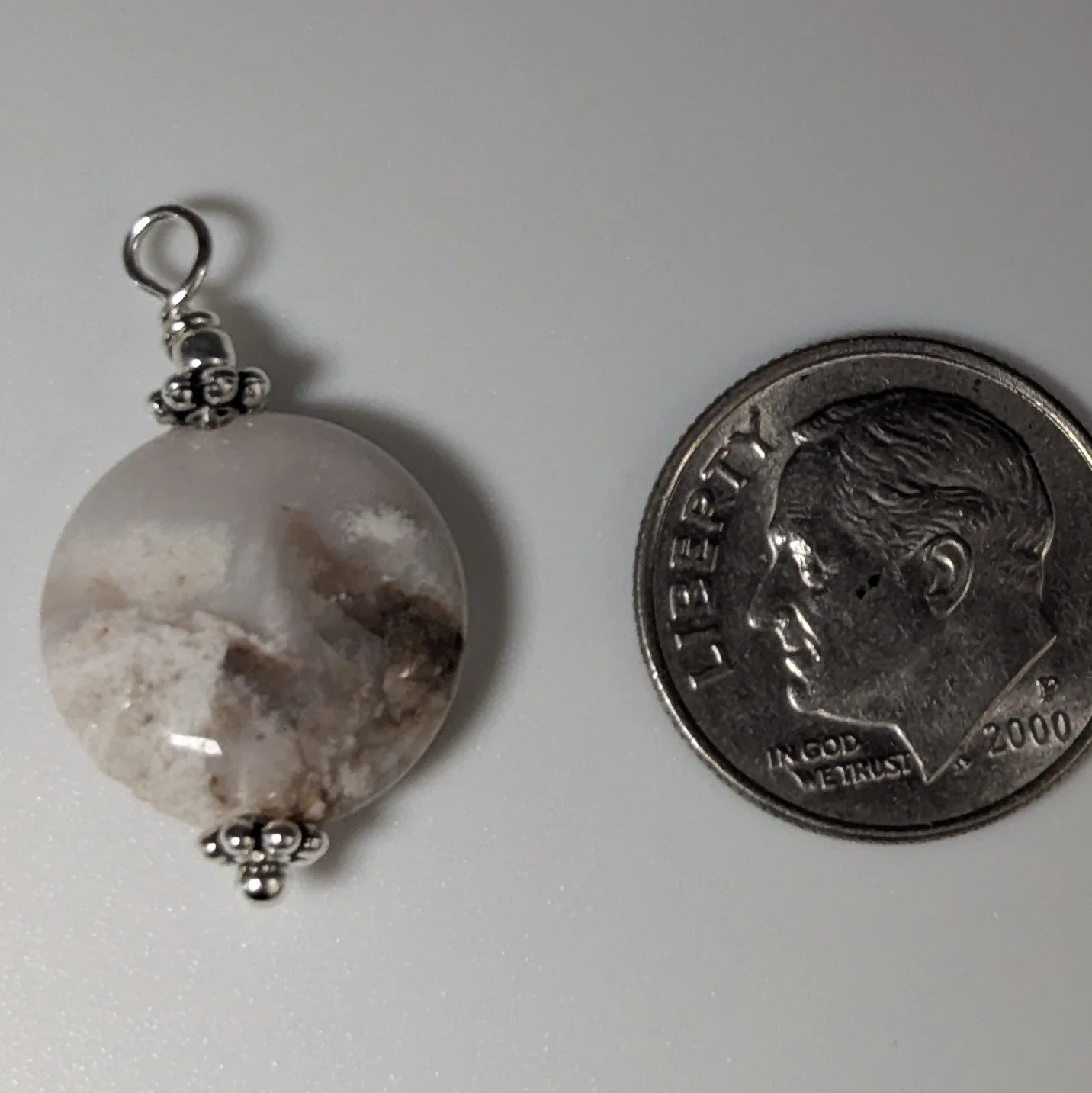 African Opal coin size.jpg