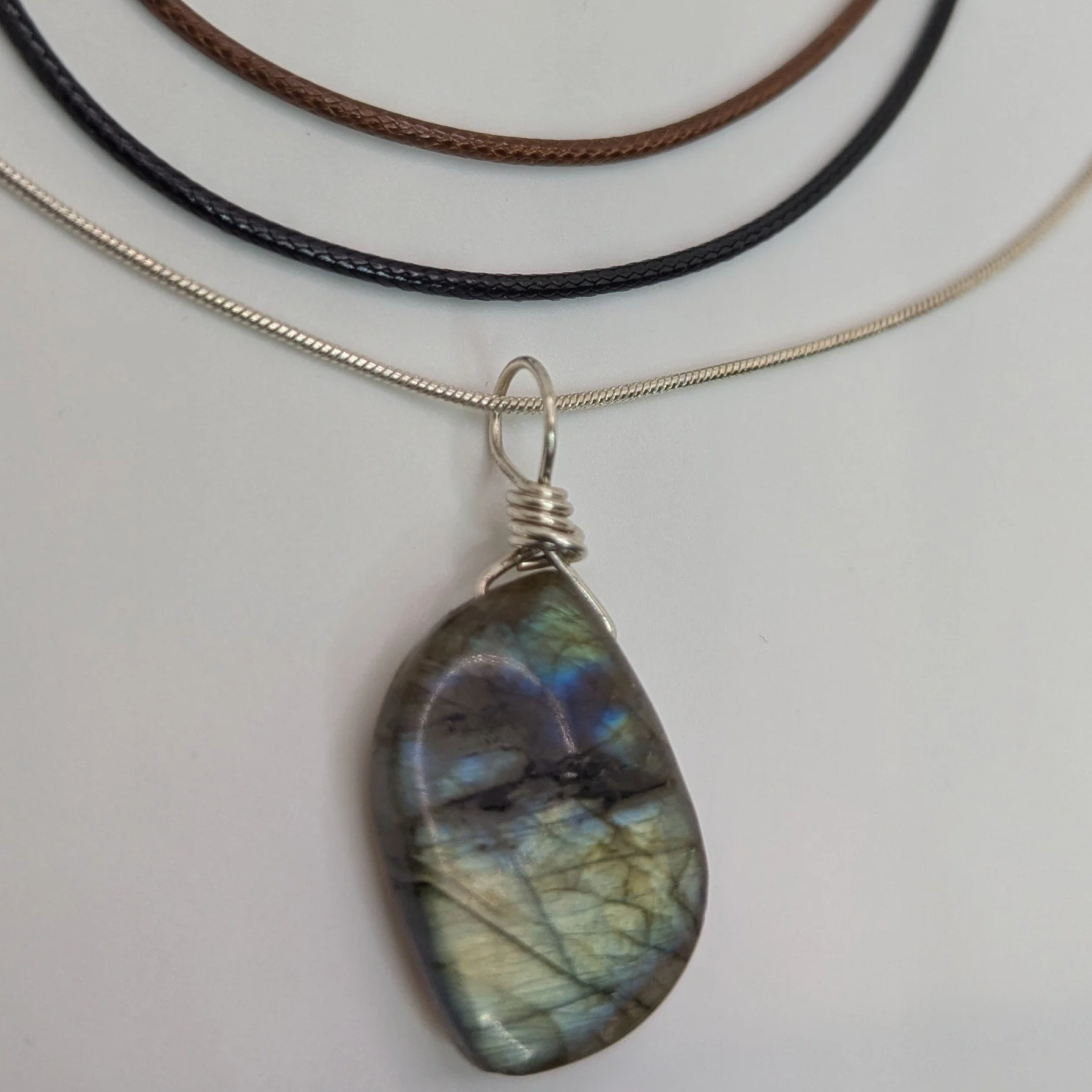 lg pendant with black and brown cords.jpg