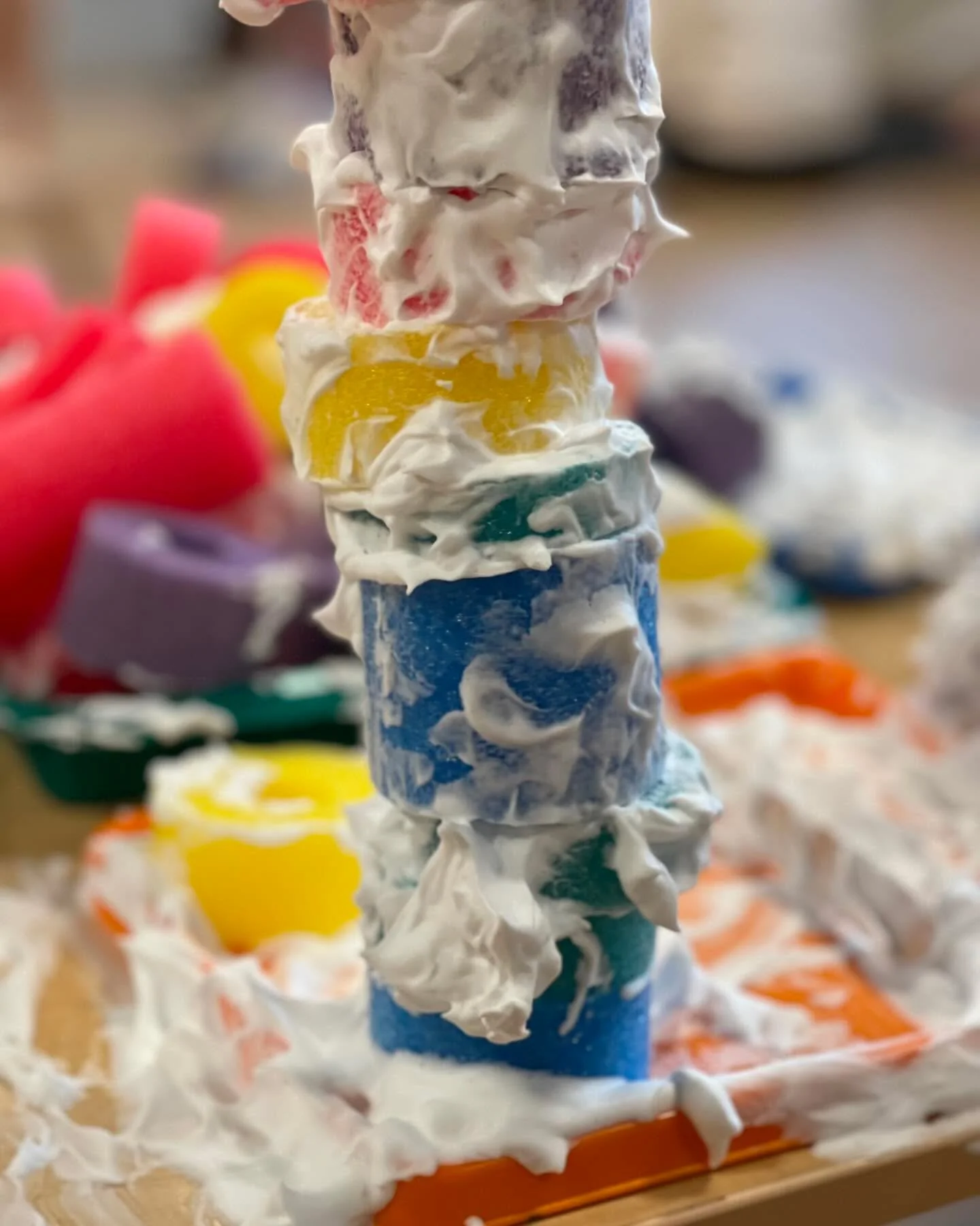 A great day of sensory play at @communityofplay! While sensory play was the theme, so many other domains of development got a workout, too, including cognitive, gross and fine motor, and social emotional! 1) Building with pool noodles, shaving cream,