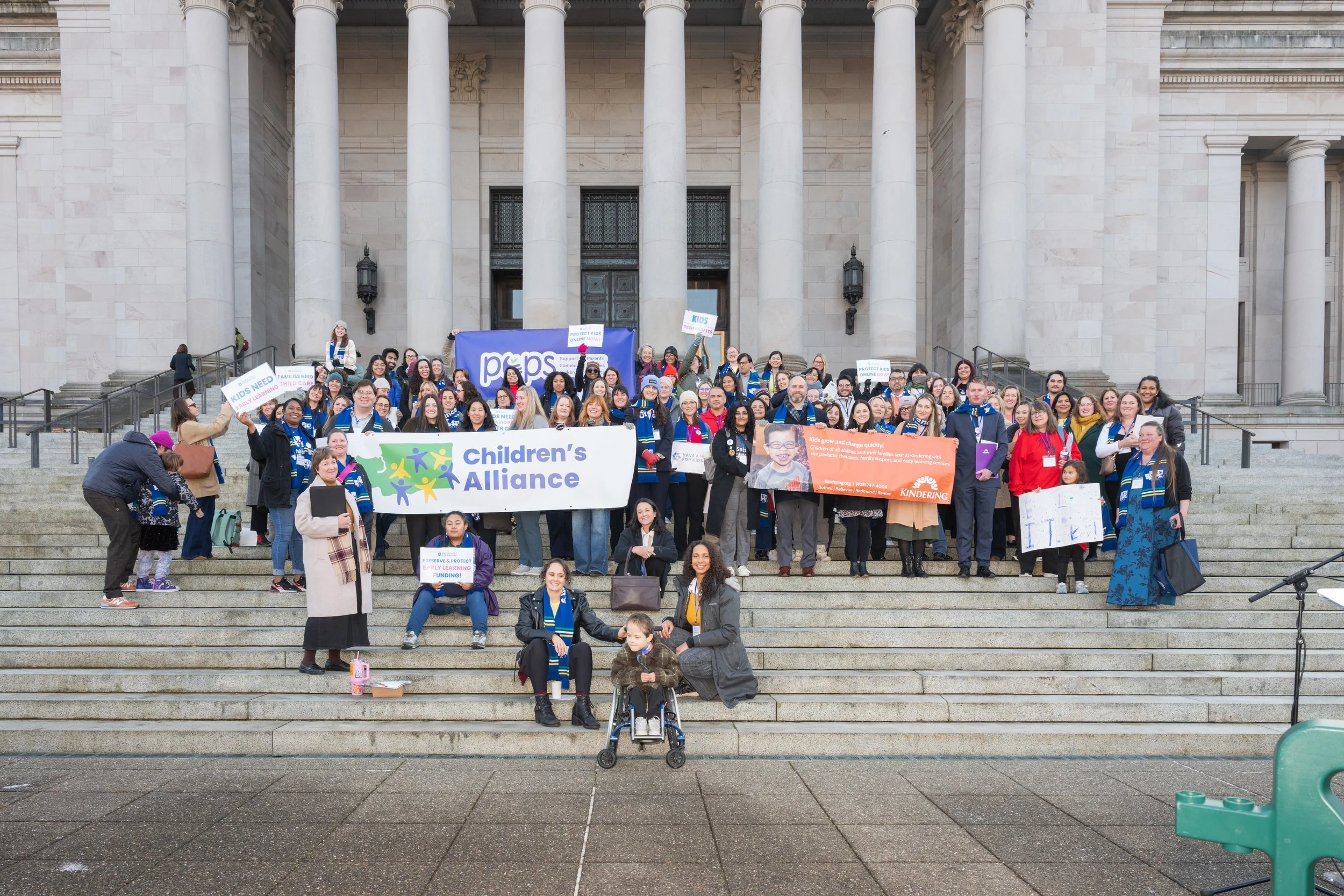 Advocates gathered on Capitol Steps in Olympia