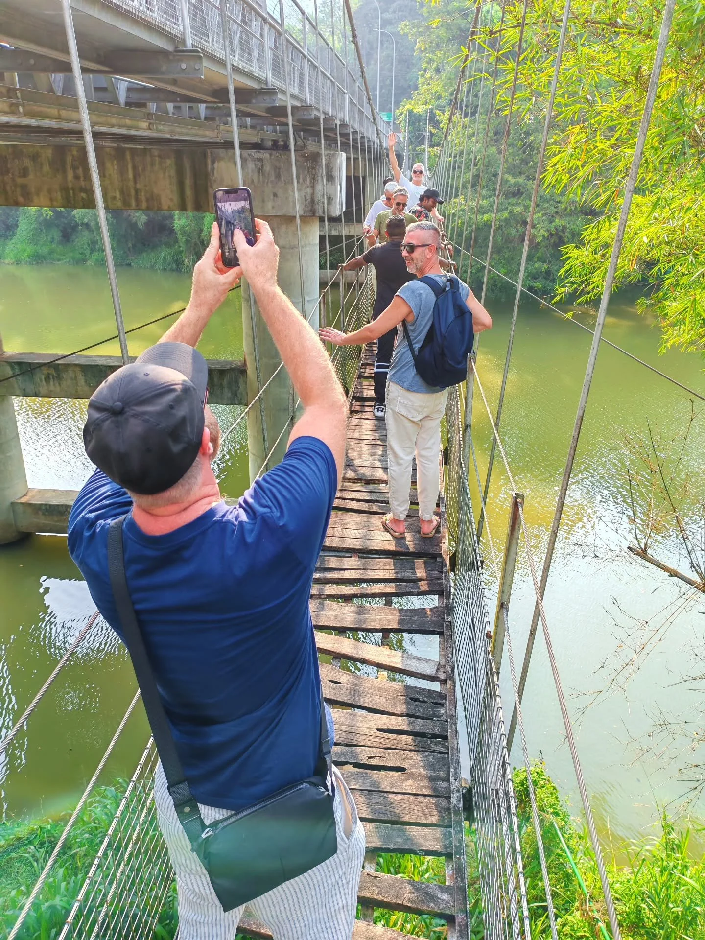 POV: the bridge looked way more stable in the photos 😭🌉✨

One minute you&rsquo;re strangers&hellip; the next you&rsquo;re laughing together in the middle of nowhere 🌿 sweating under the Asian sun ☀️ taking 500 photos 📸 and trying not to fall off 
