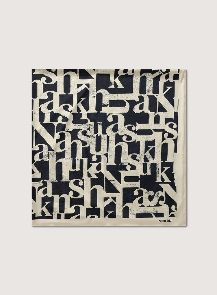 nanushka-miani-large-logo-scarf-creme-black--efcbfb29831e5f79cce92b807309.jpg