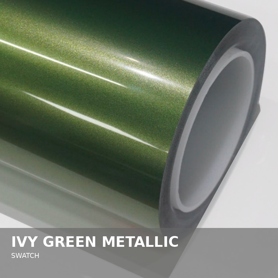 Close-up view of a green metallic vinyl swatch roll.
