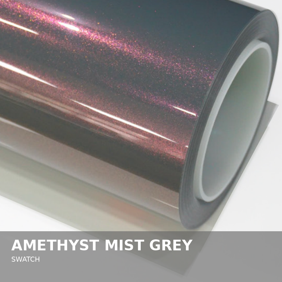 Close-up of a metallic roll with grey color and a galaxy-style pattern of pink, purple, and white sparkles, labeled as "Amethyst Mist Grey" swatch.