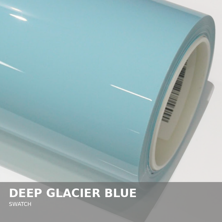 A roll of deep glacier blue swatch vinyl or wallpaper material.