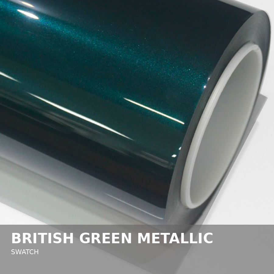 A close-up of a speaker with a British Green Metallic color and a white rim, showcasing a shiny, smooth surface.