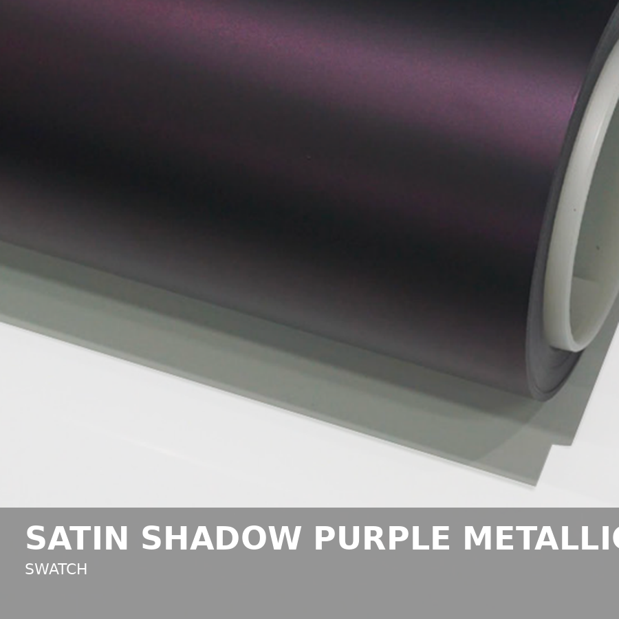 A roll of satin shadow purple metallic vinyl film on a white surface.