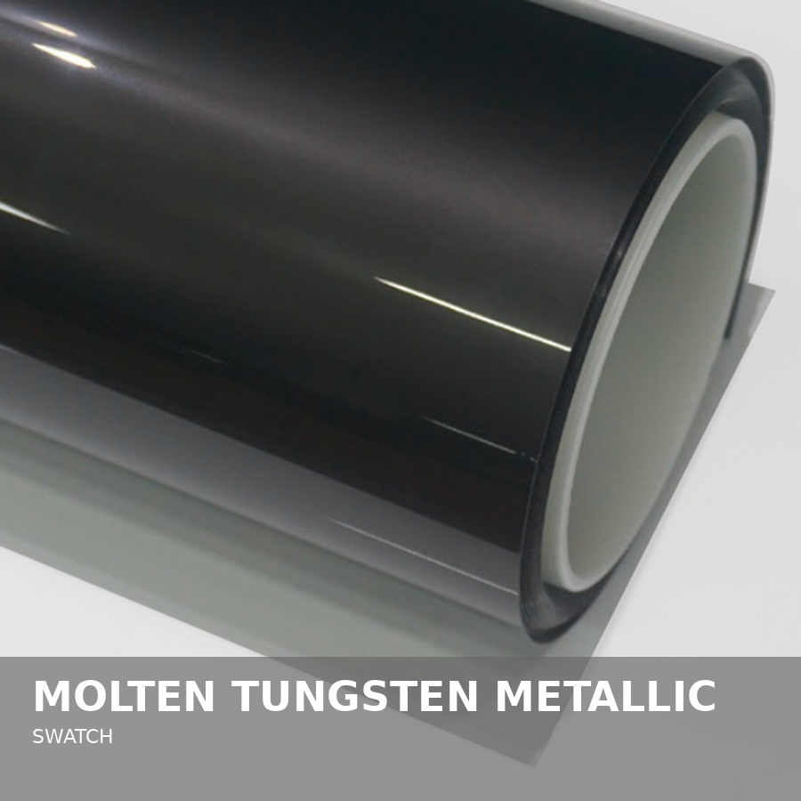 Close-up of a rolled sheet of molten tungsten metallic swatch with reflective black surface and a white core.