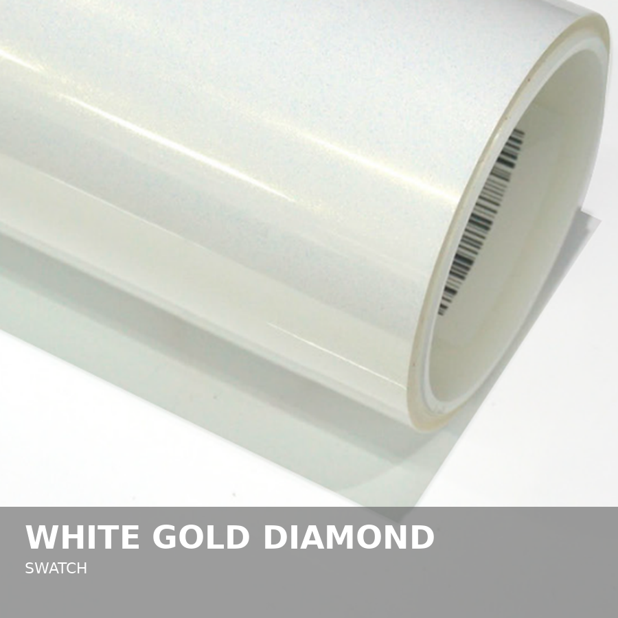 Close-up of a white, gold, and diamond-themed swatch or sample roll with a barcode edge.