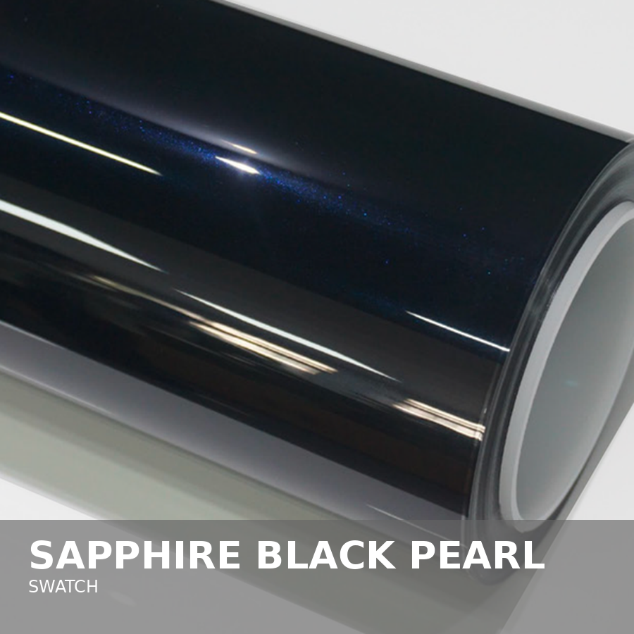 Close-up of a roll of glossy black vinyl with blue glittery pearl effect, labeled 'Sapphire Black Pearl Swatch'.