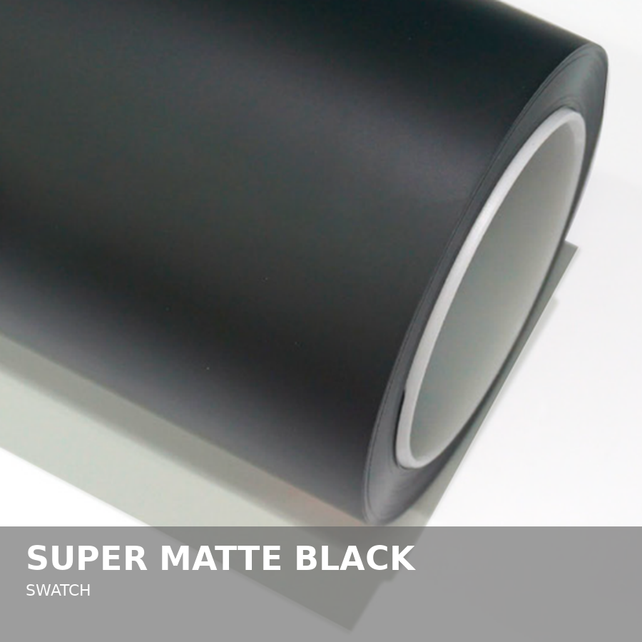 A black roll of Super Matte Black Swatch material on a flat surface.