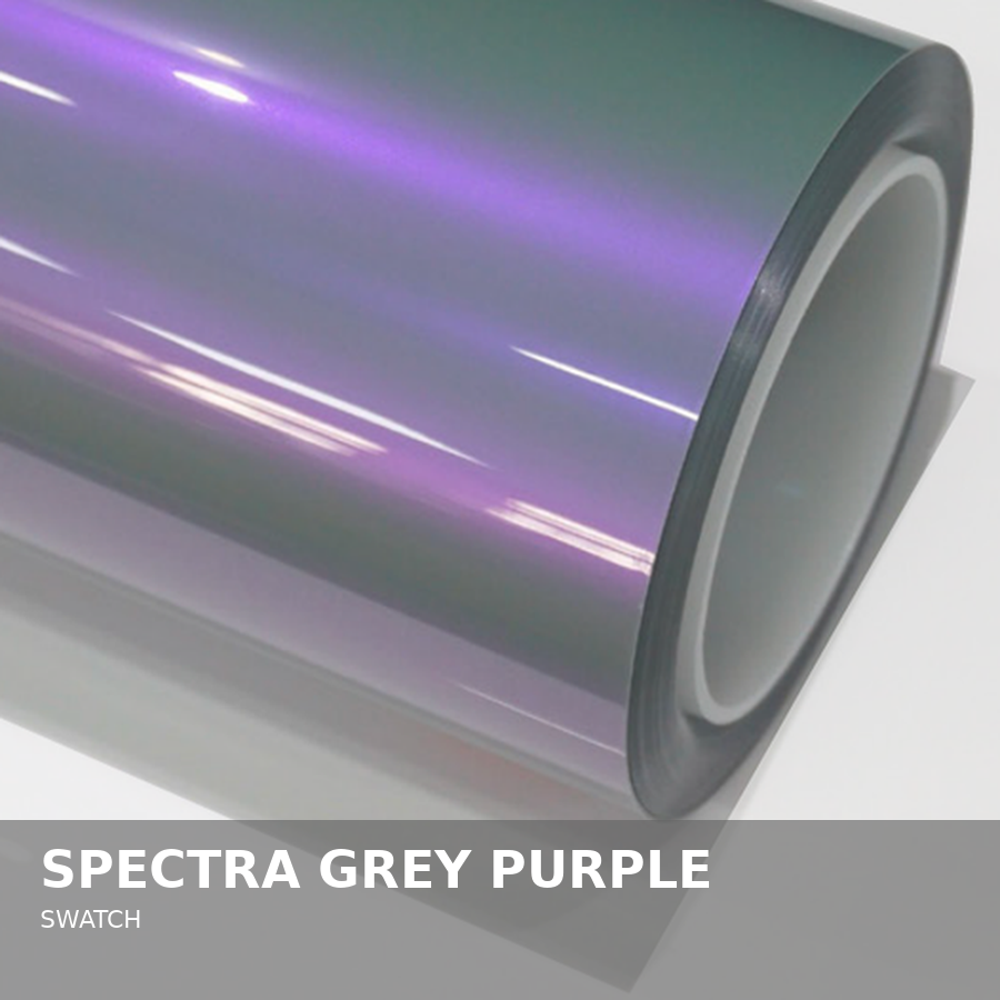 A roll of reflective vinyl film in spectra grey purple color with a shiny surface.