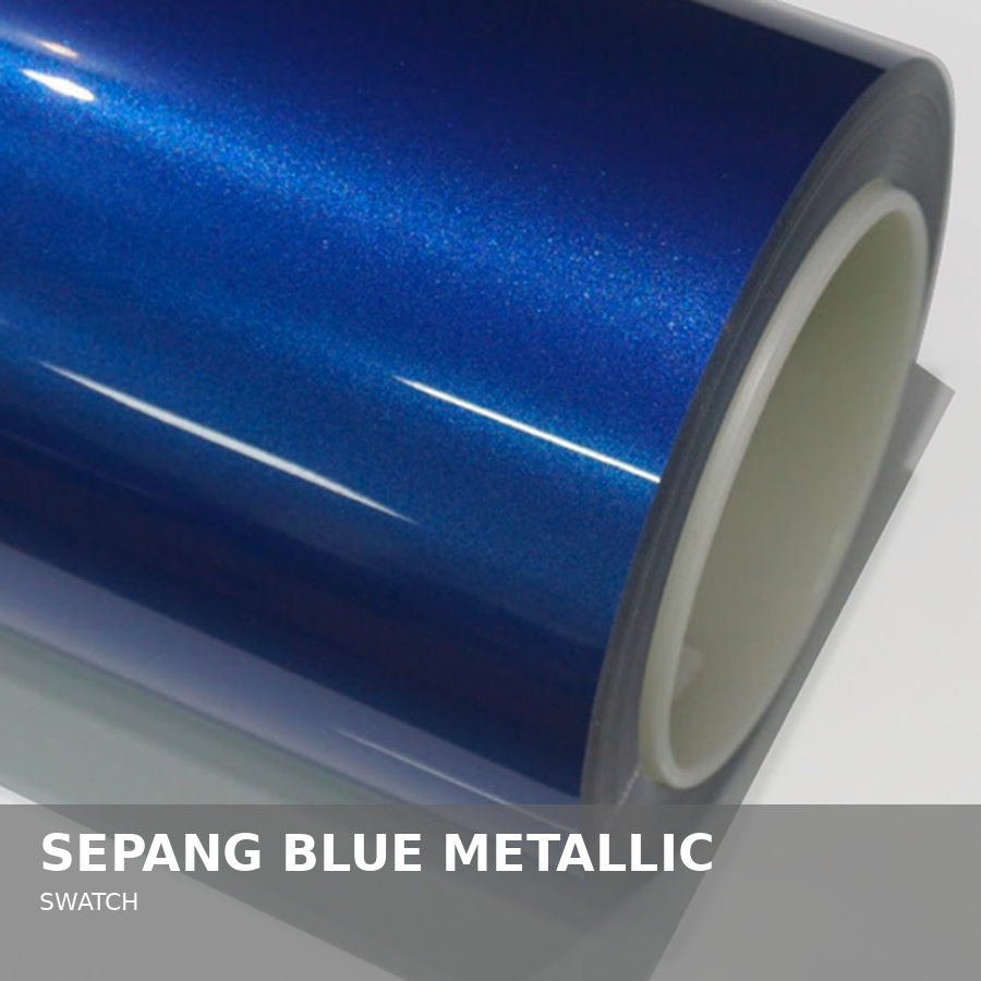 Close-up of a roll of septang blue metallic vinyl material, used for printing or wrapping.