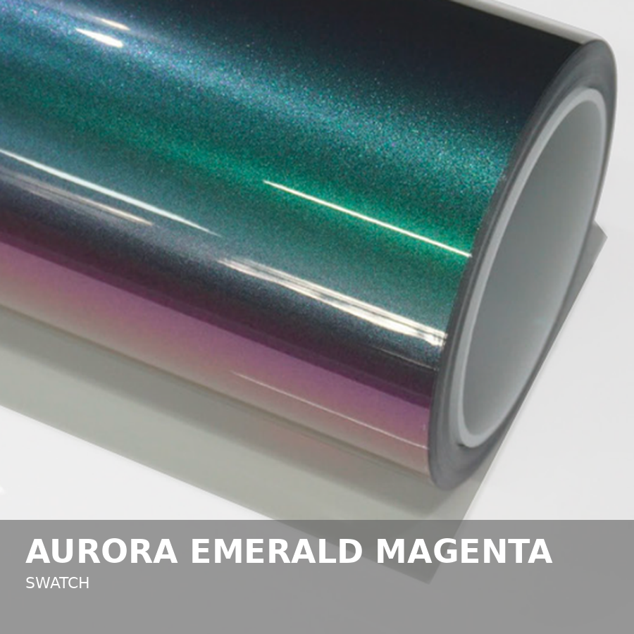 Close-up of a roll of adhesive vinyl film with an aurora emerald magenta glitter finish.