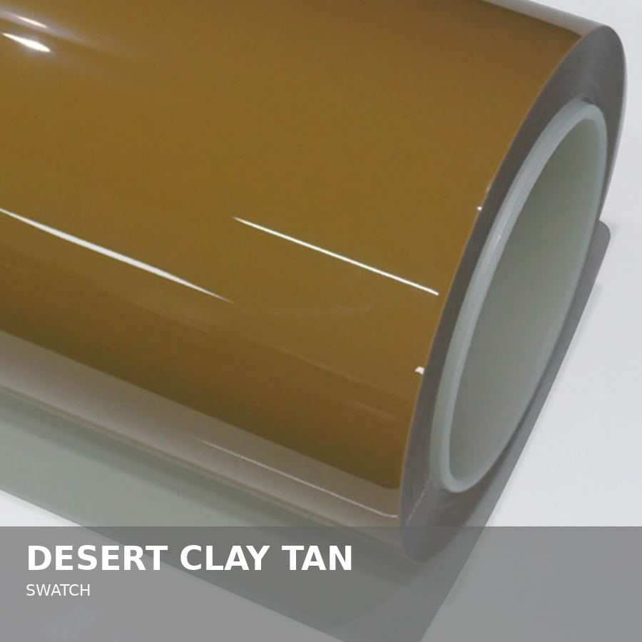 A cylindrical ceramic mug with a desert clay tan color glaze, viewed from an angle.
