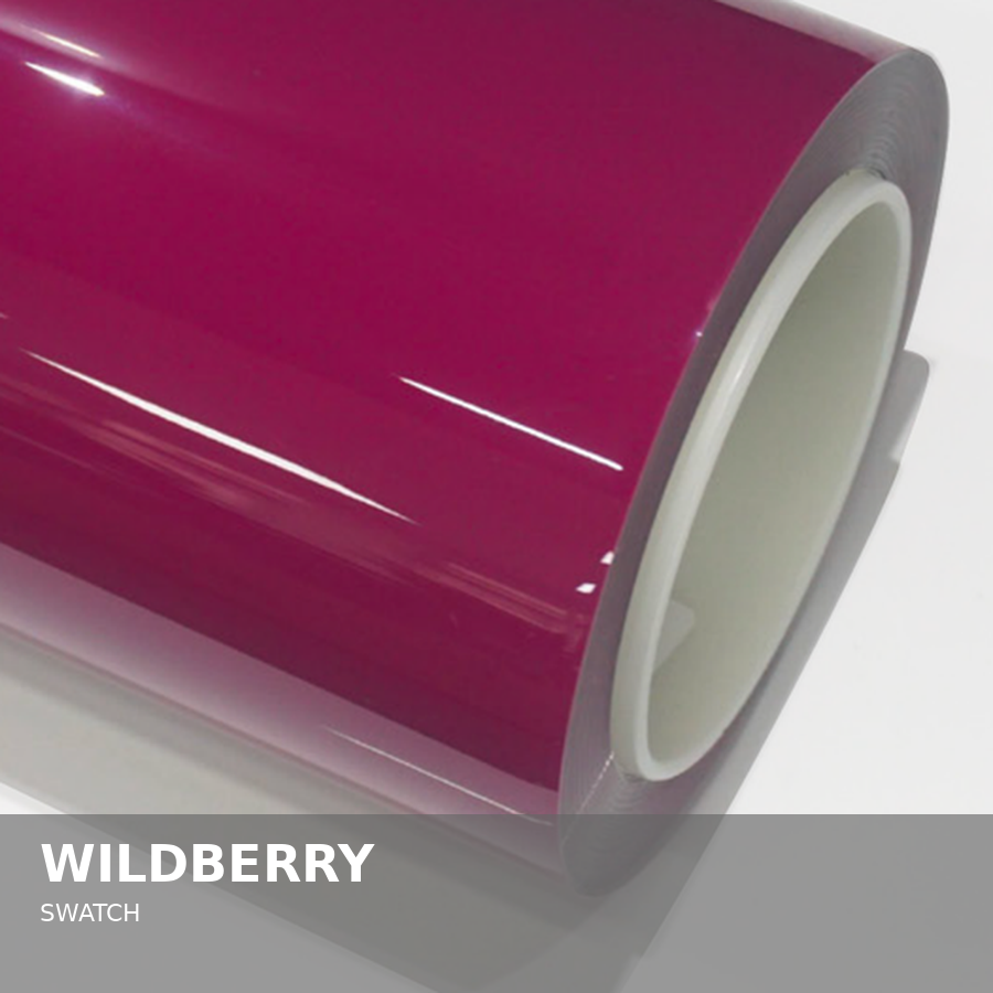 Close-up of a magenta-colored vinyl swatch roll with a white interior core, labeled 'WILDBERRY SWATCH'.