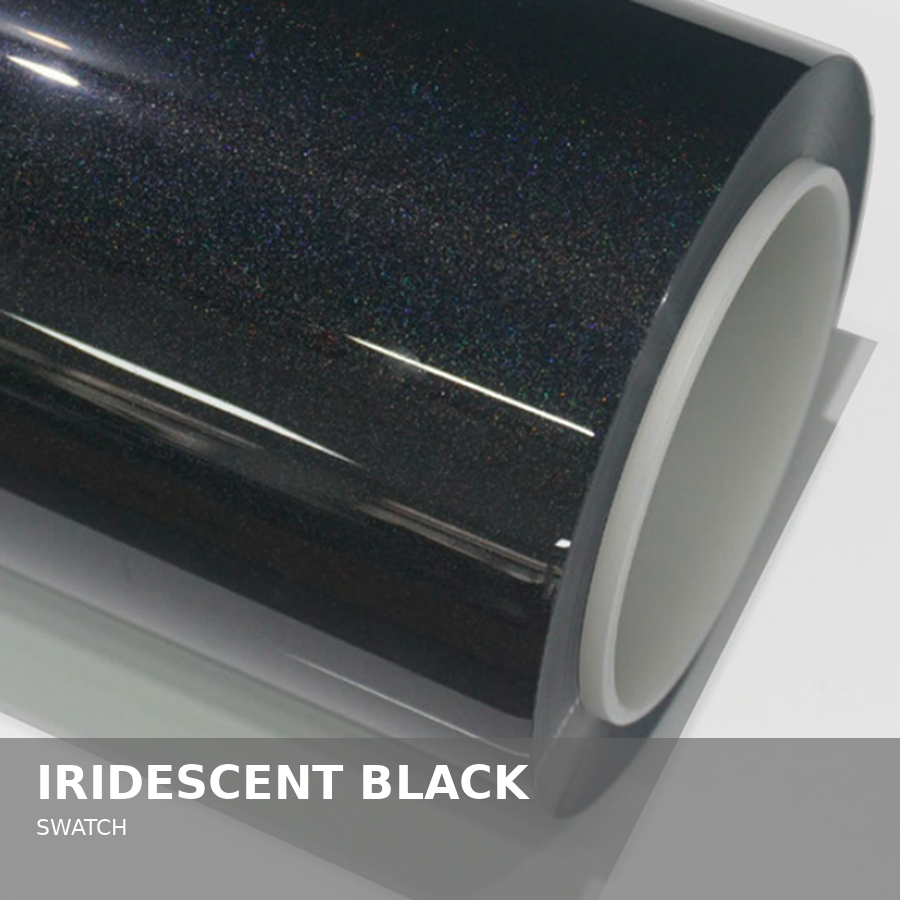 A roll of iridescent black vinyl with glittering particles, used as a swatch sample.