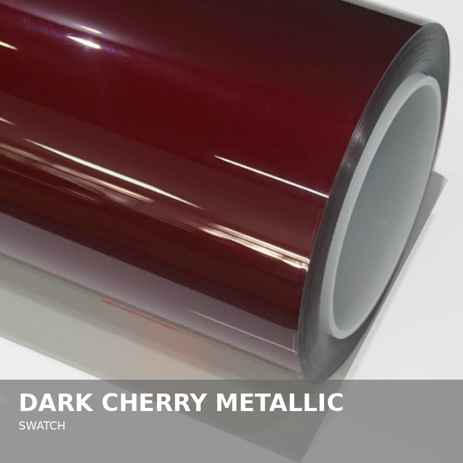 Roll of dark cherry metallic swatch material.