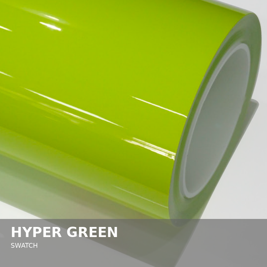 A roll of bright green vinyl film with a glossy finish, partially unrolled.