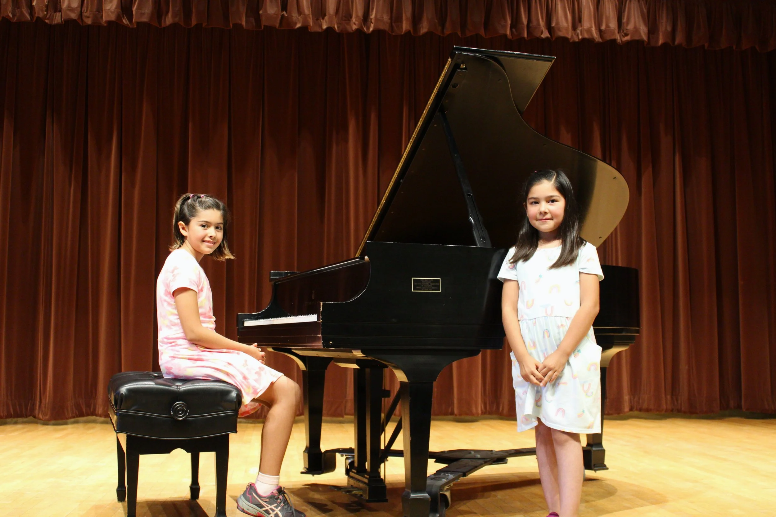 Sophia and Elena Piano and Singing.jpg