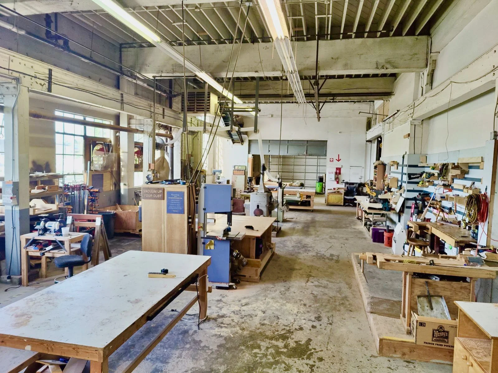 Well-equipped wood shop – saws, planers, sanders, drill presses, etc.