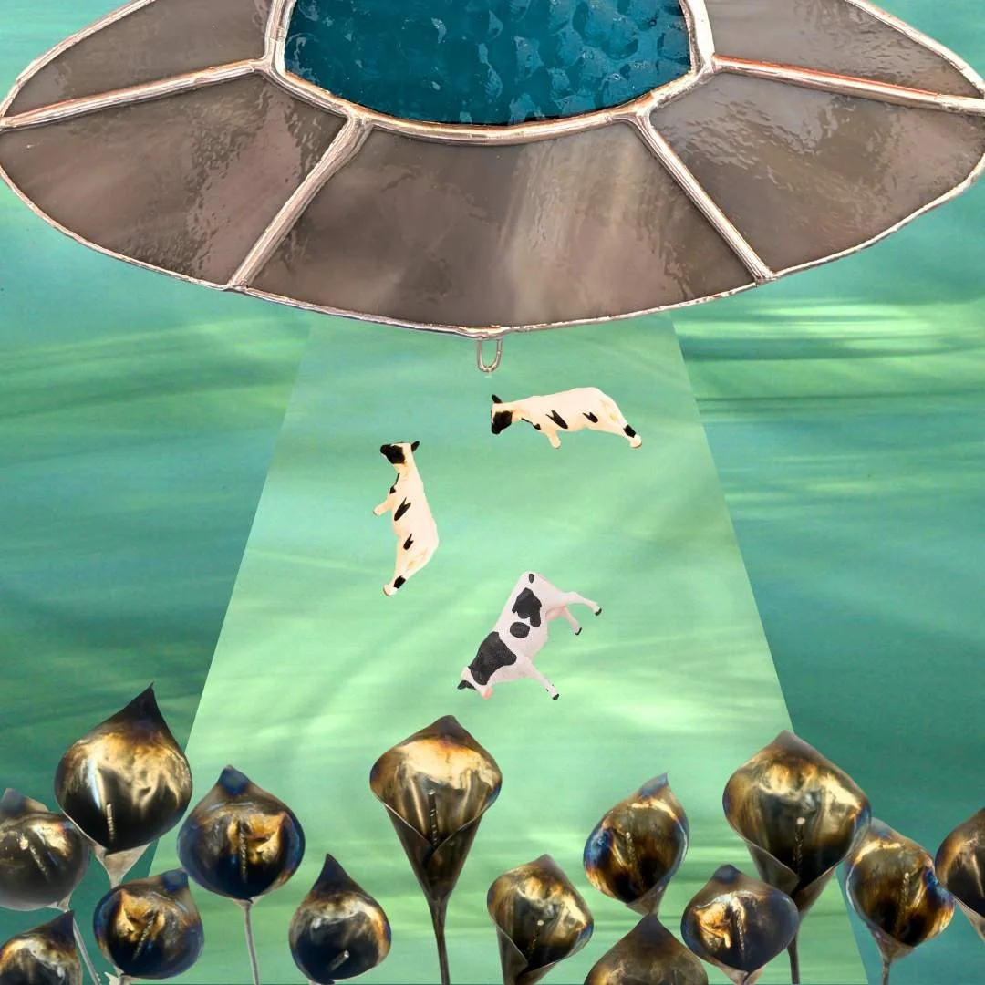 Stained glass UFO above a field of metal calla lilies