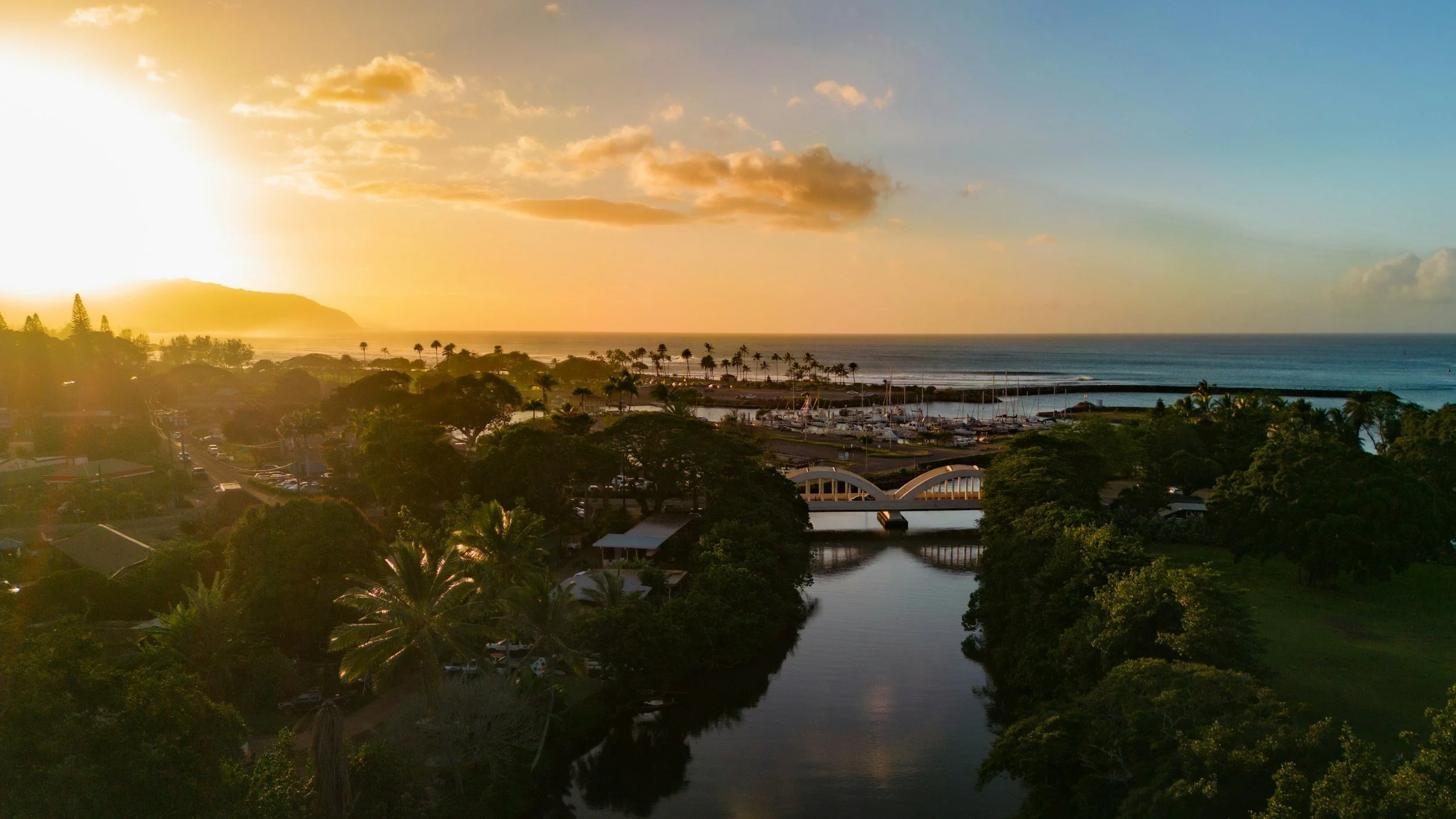 Historic Haleiwa town on Oahu’s North Shore with colorful shops, surf culture, and gateway to Turtle Bay Resort.