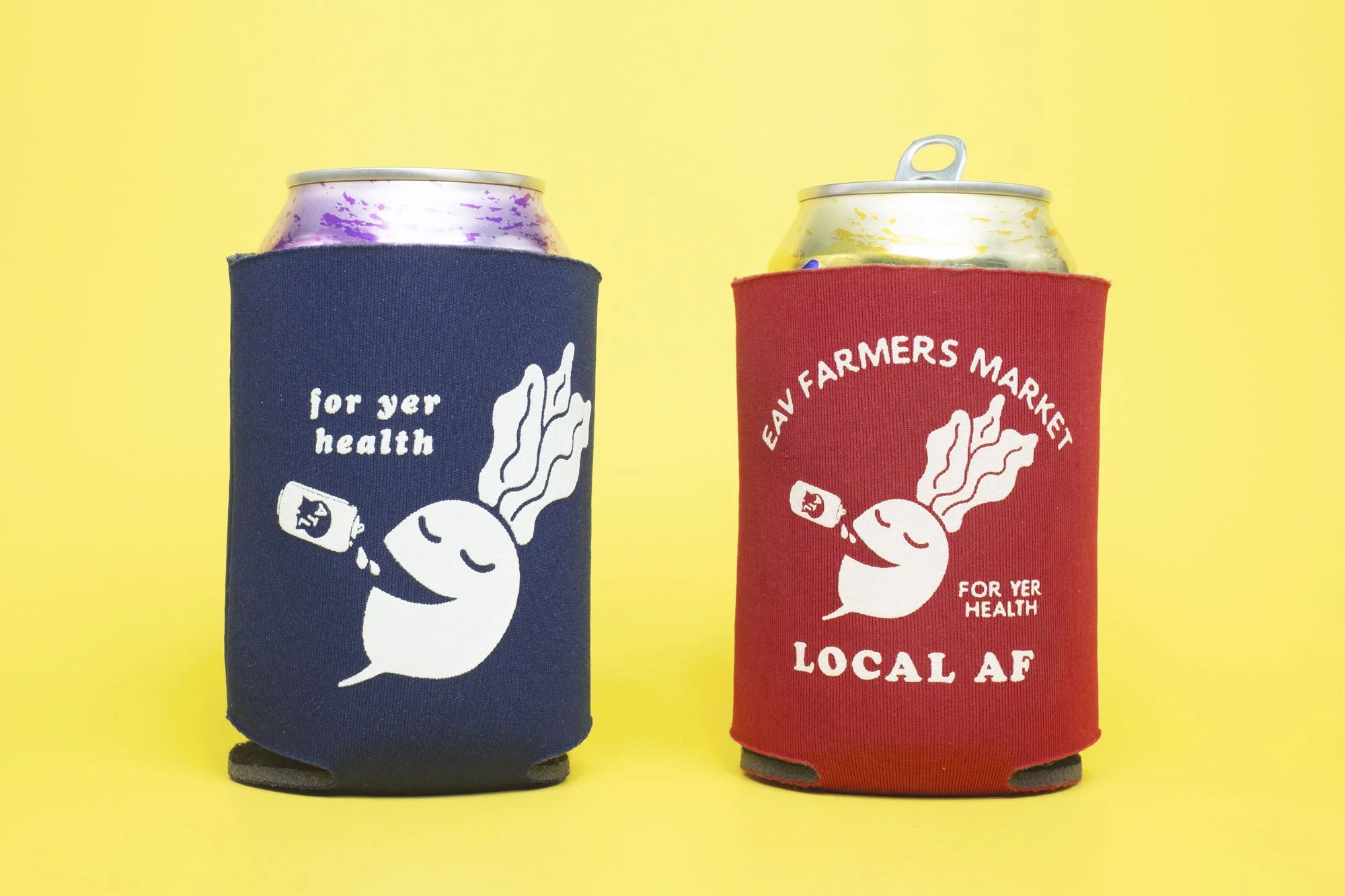 Two LaCroix cans are side by side on a yellow backdrop featuring an insulated koozie. with a radish drinking beer. The radish looks content and the text "For your health" and "Local A F" adorn the koozie
