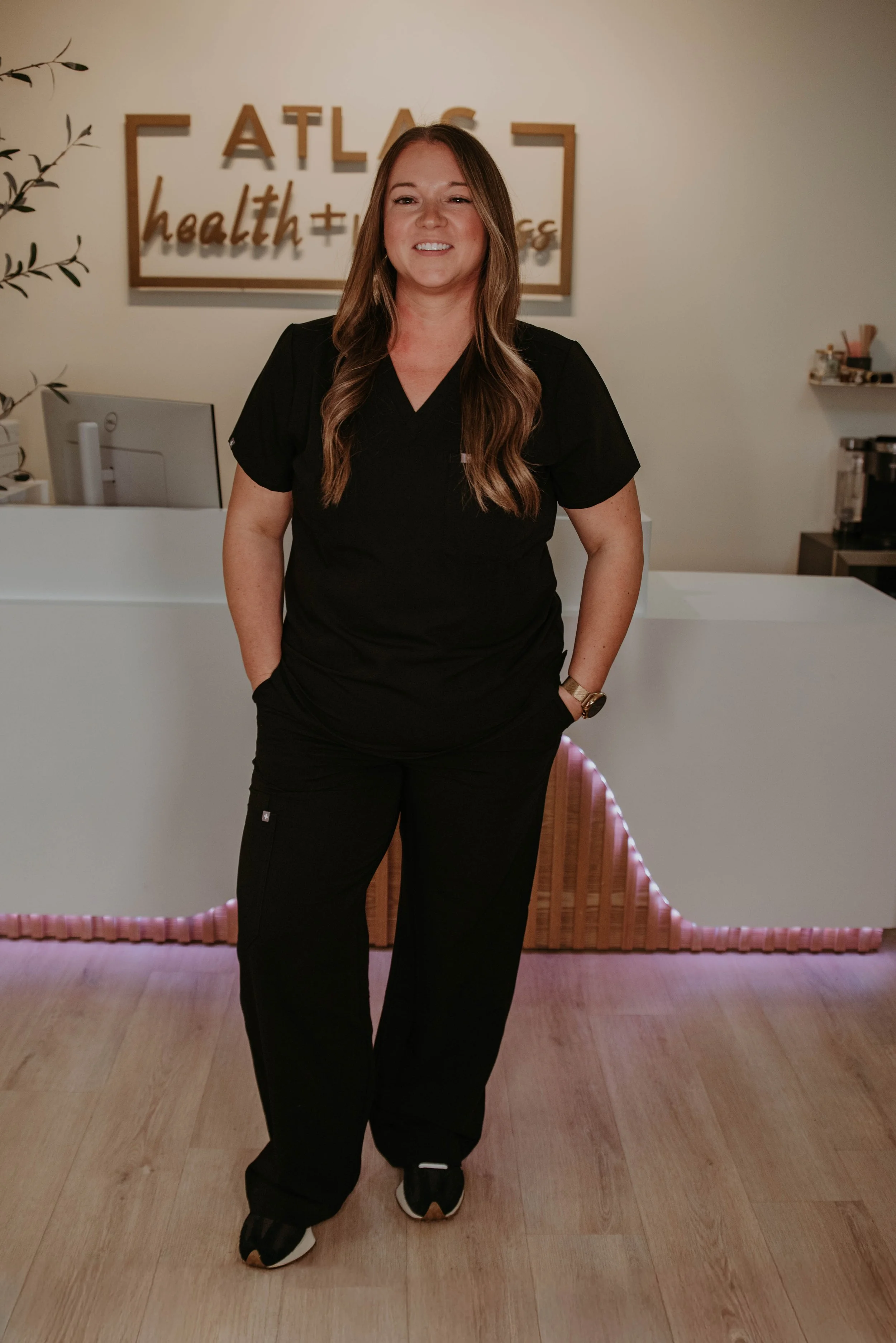 Ashley Addis, LPN at Atlas Health & Wellness, supporting patients with personalized care