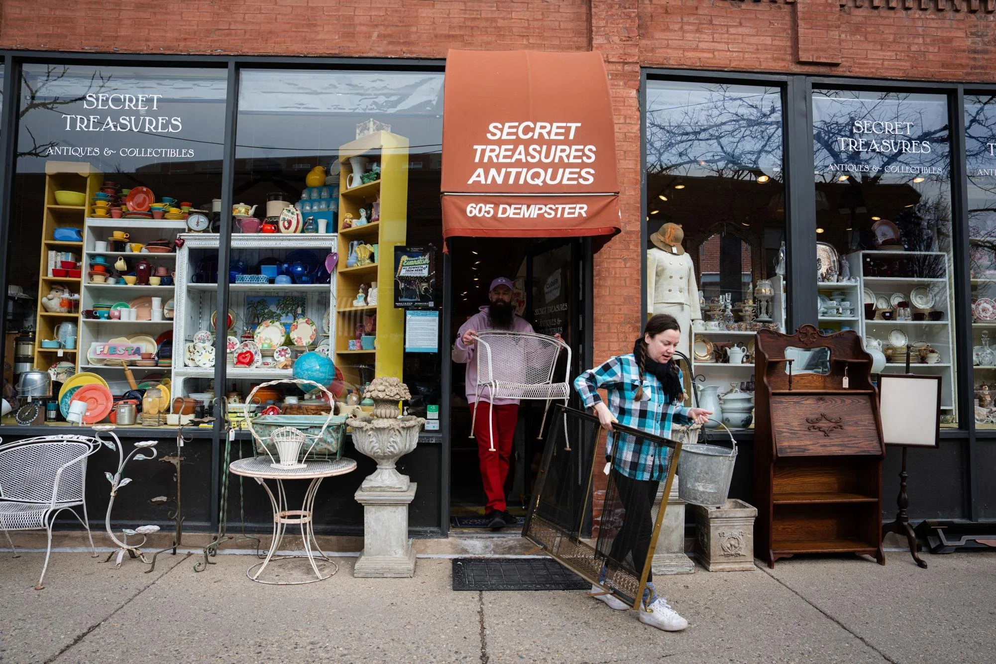 James and Chorba move various antiques outside the store for display. Chorba first came into Secret Treasures with her mother, who was a big fan of the store. 

She said that the store creates relationships with customers – remembering people’s names