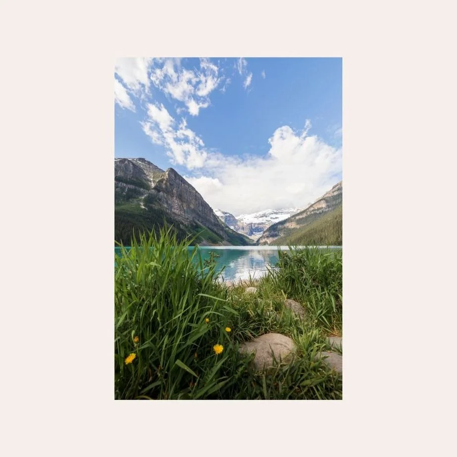 Fine art landscape photograph of Lake Louise in Banff National Park Canada with turquoise water and mountain scenery