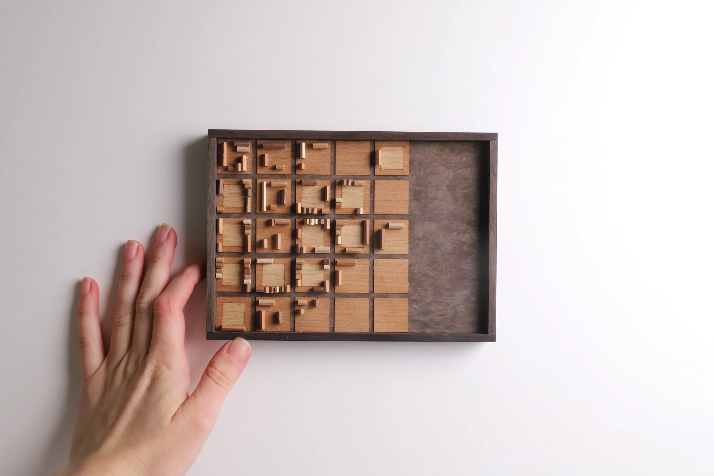 Squares in Cities 2 with hand.JPG