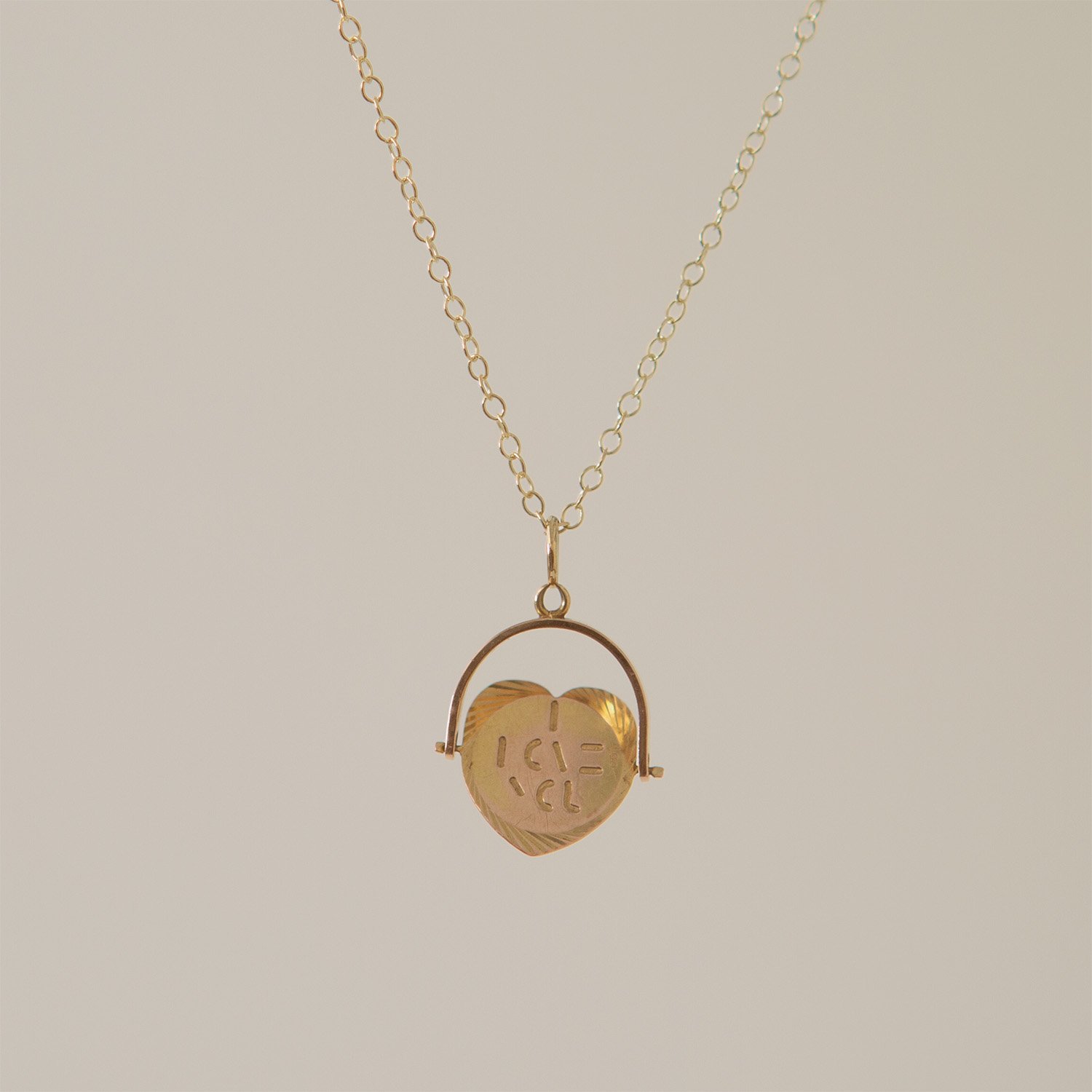 Hidden Love Spinner Necklace