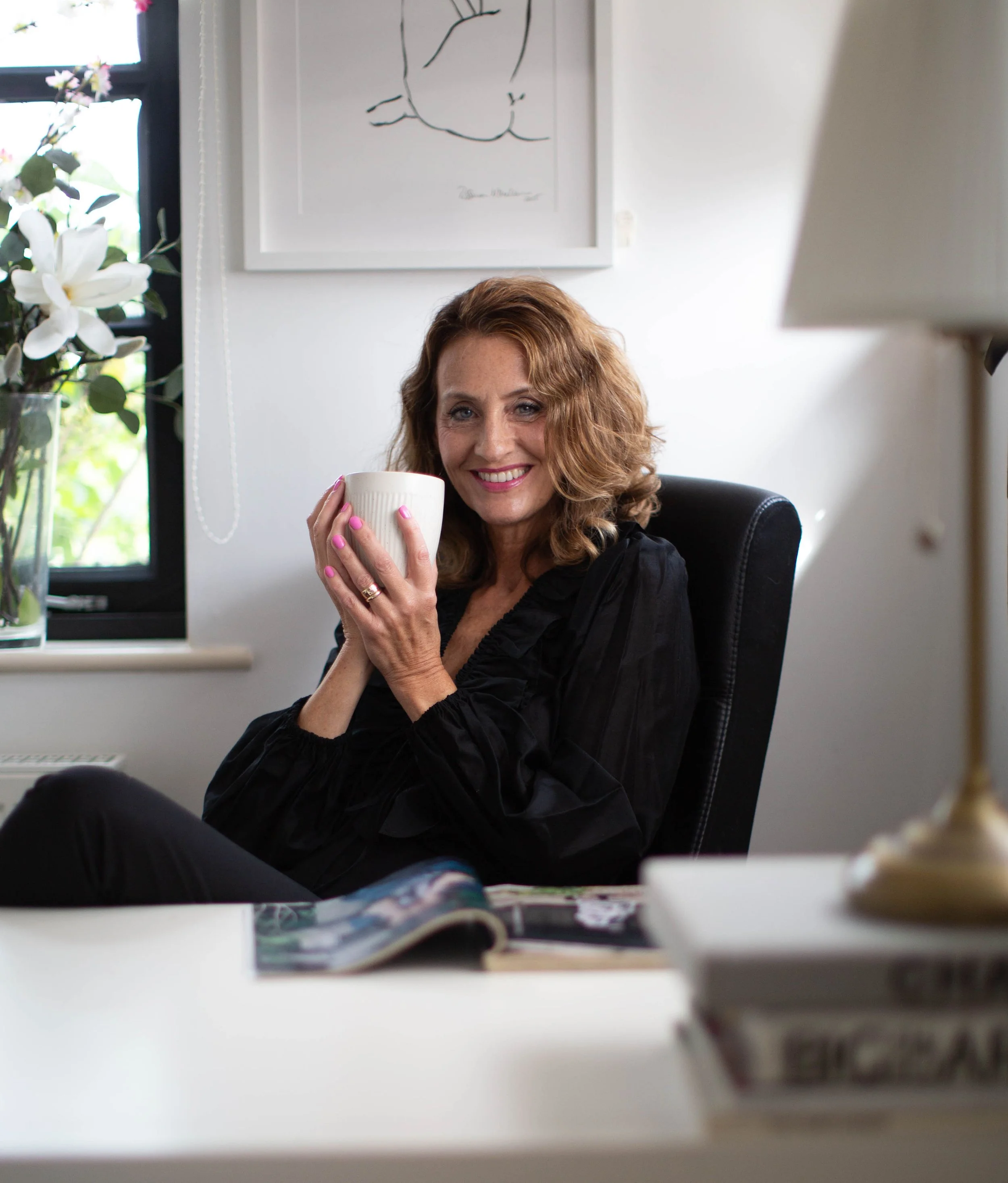 Meryl by Rosanna Novella at desk with coffee cup.jpg