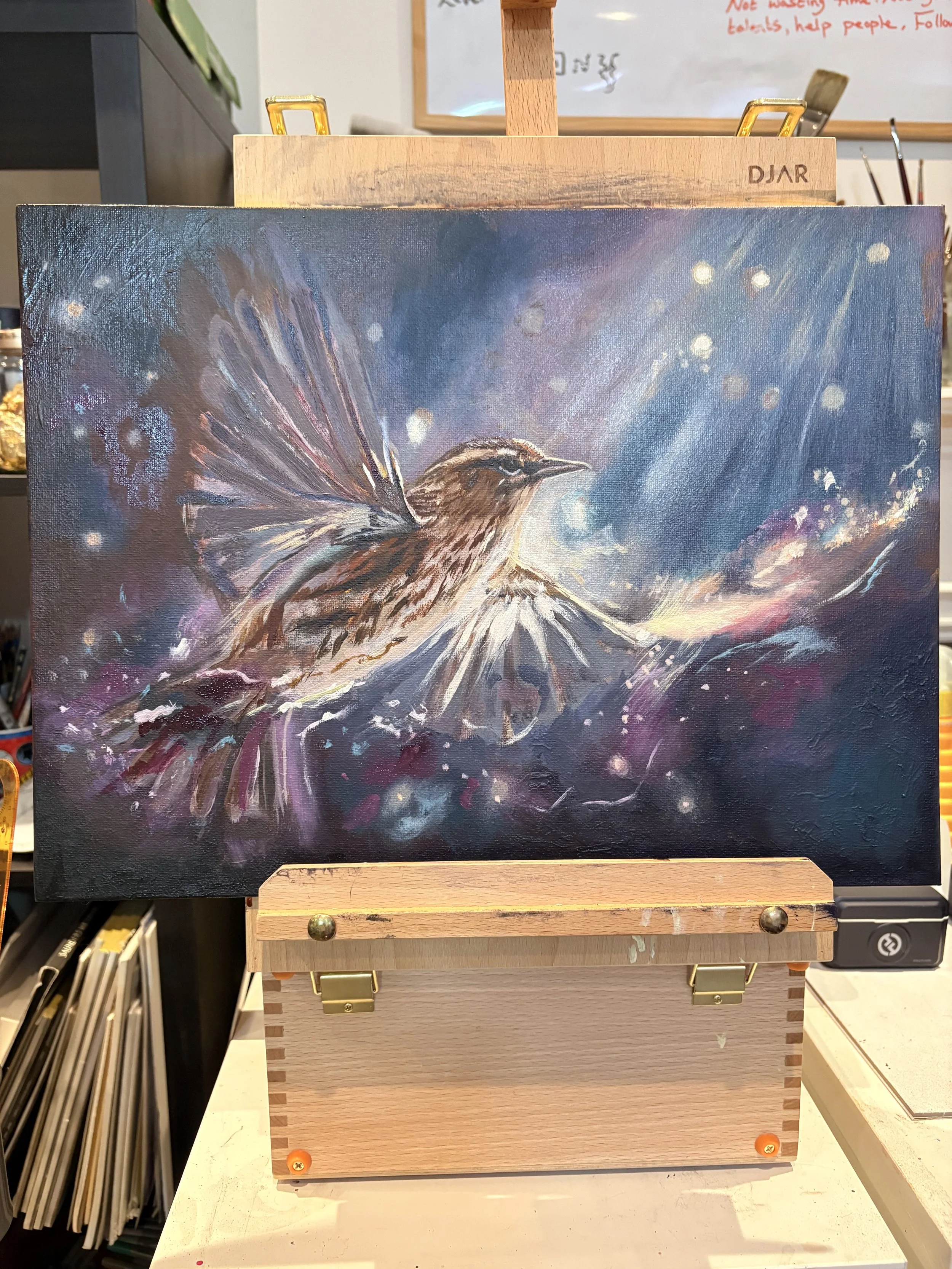 A painting of a bird with outstretched wings against a cosmic background of stars and nebulas, with vibrant colors and light effects.