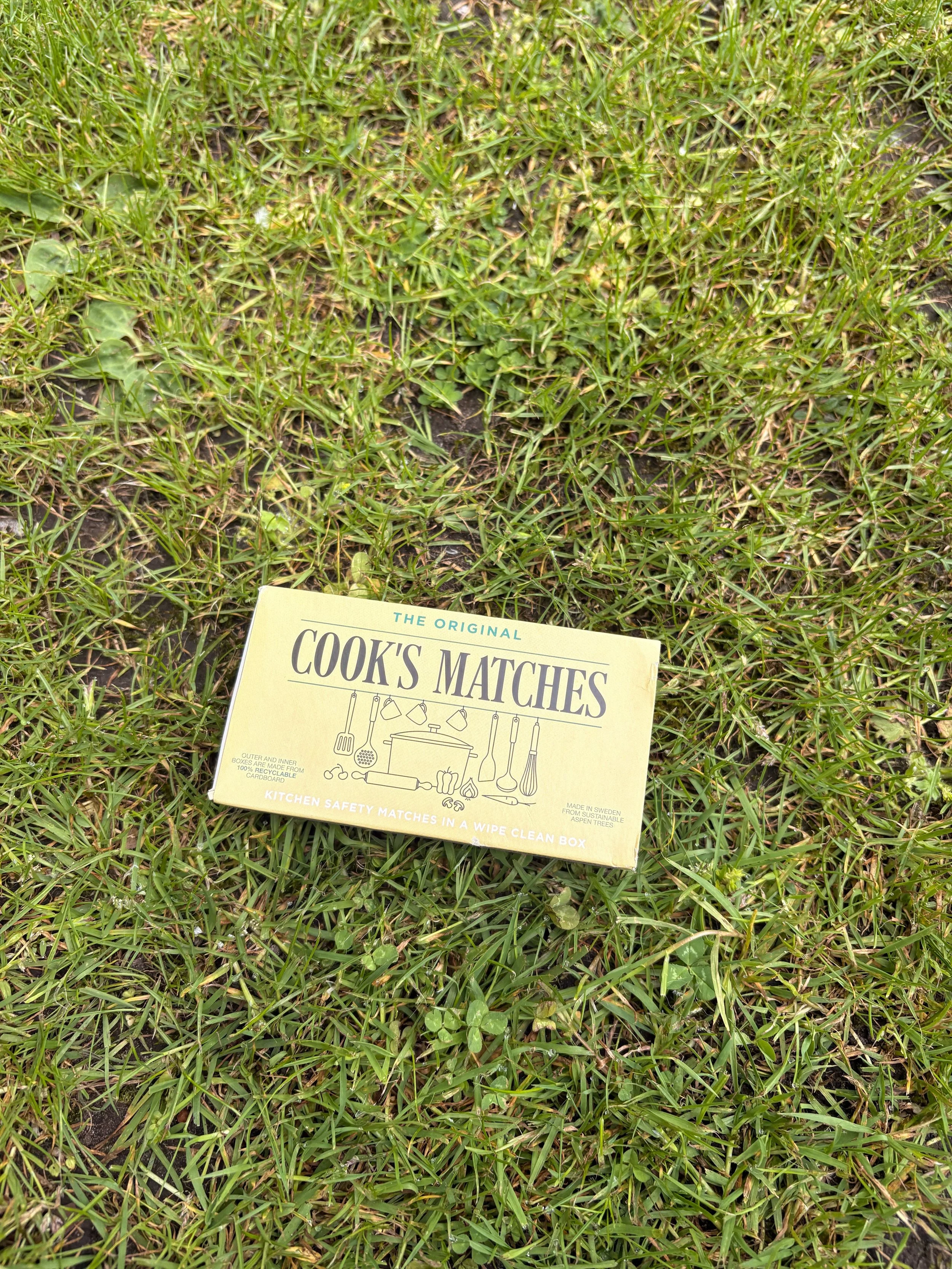a matchbox placed in grass