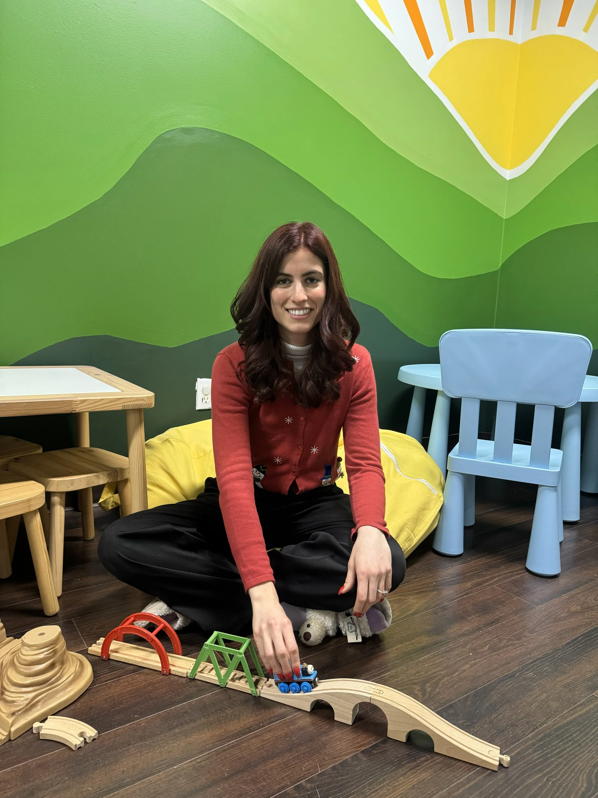 Kim having fun in our EI room!