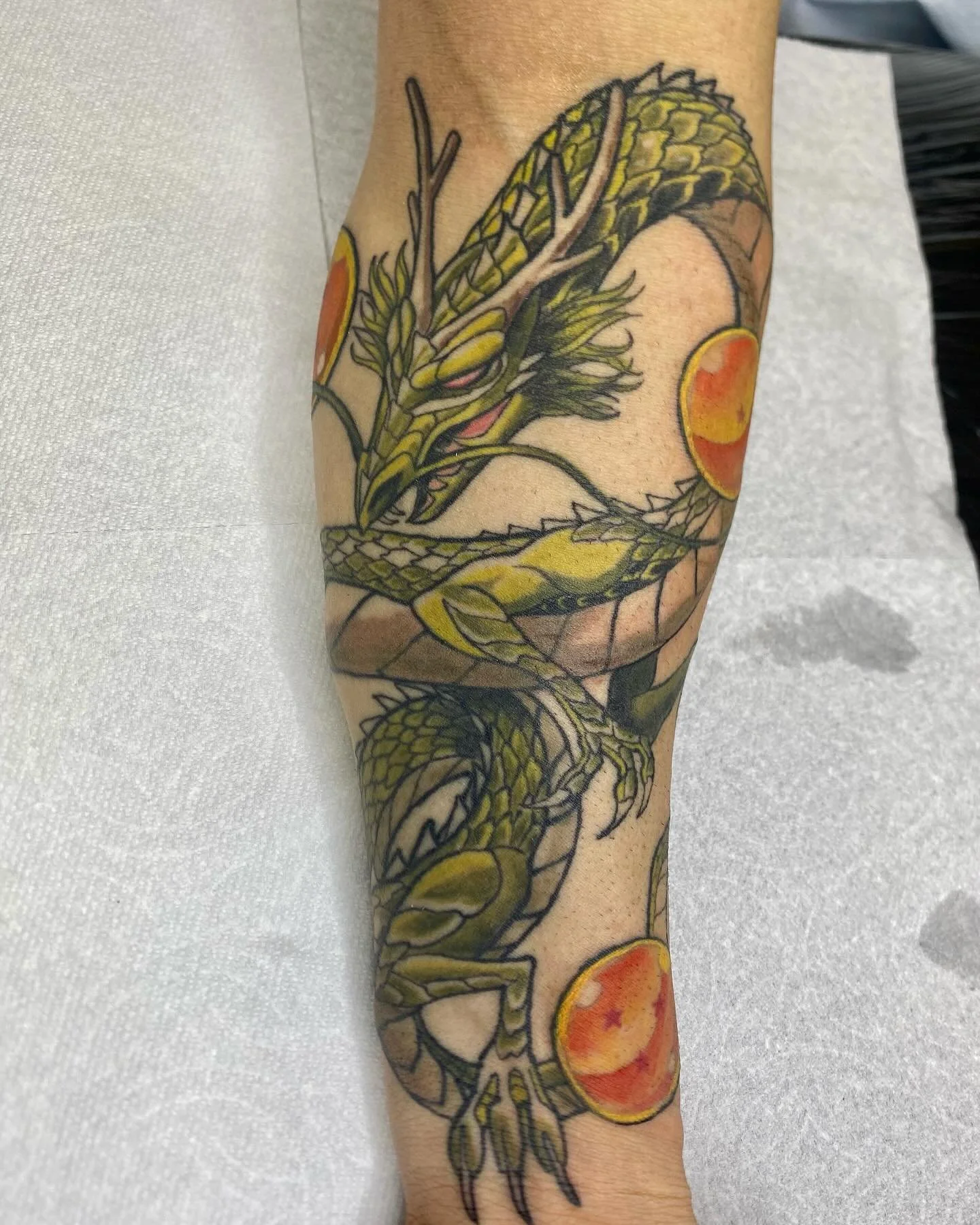 I really enjoyed making this illustrative take on Shenron for the father of another great client. It makes me so happy to tattoo dragons, especially on multiple generations of the same family! So neat! Thanks Manuel!