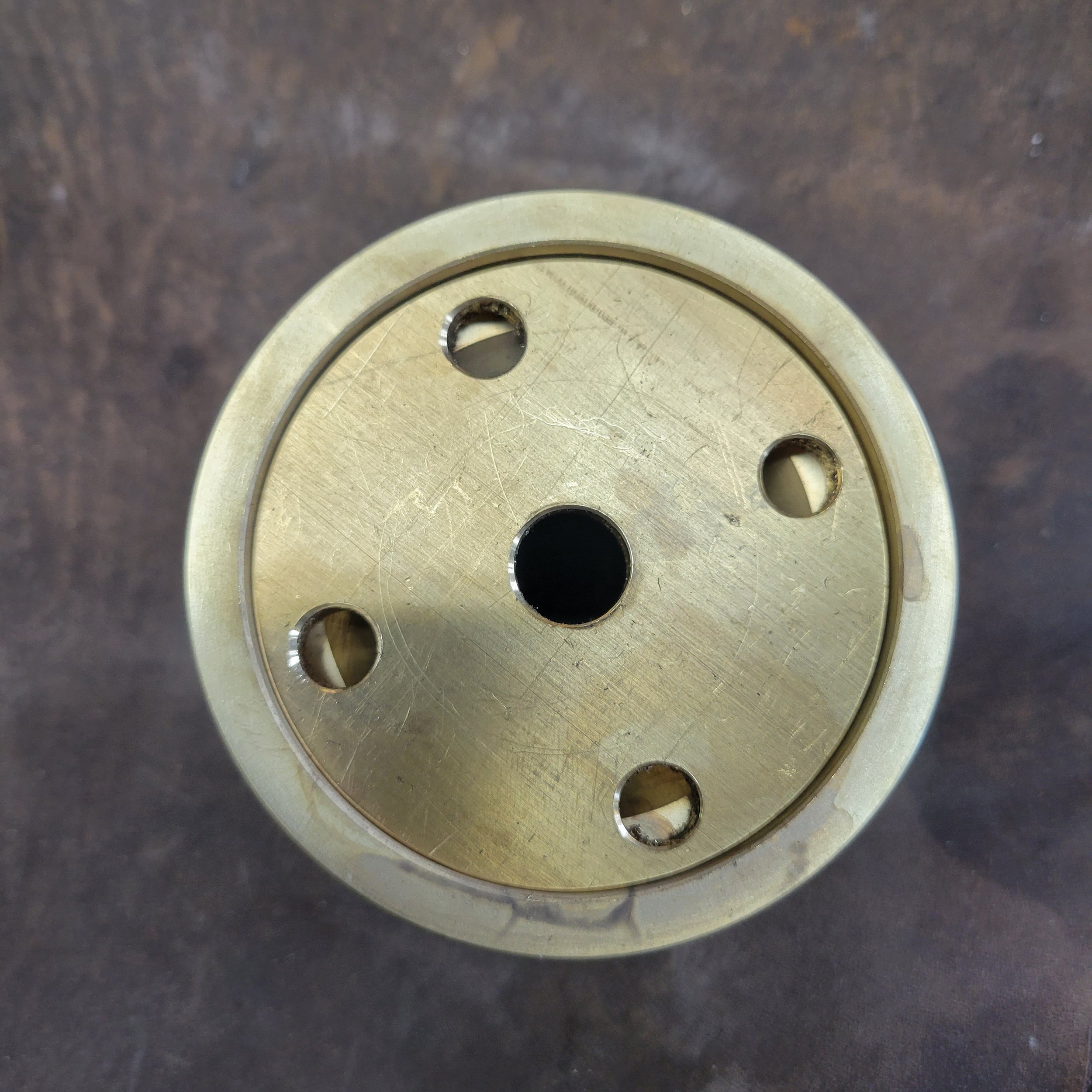 A tight fit between the post shoe and the installation plate.