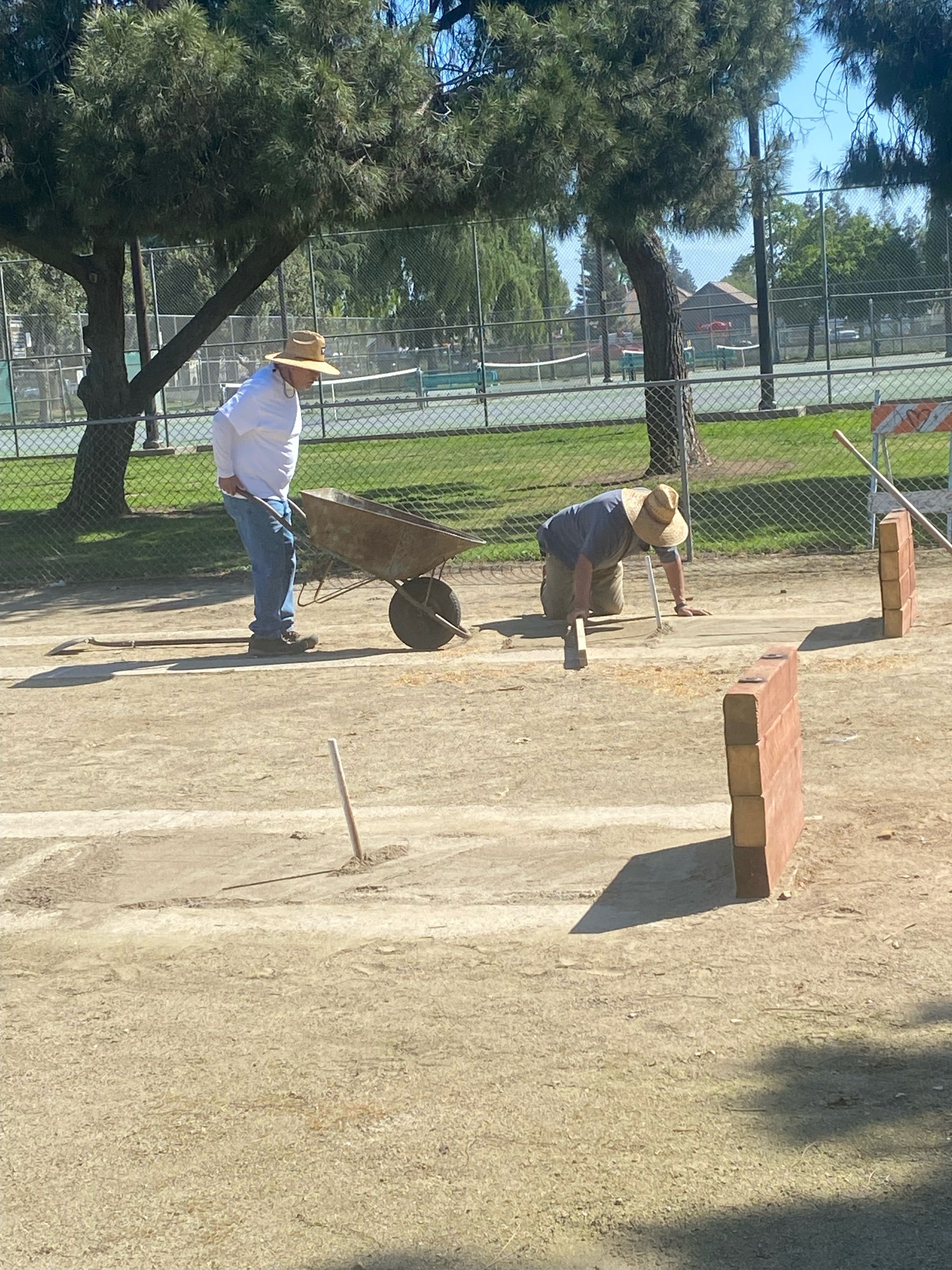 Tulare CA, Frank and Philip Arroyo maintaining the pits.