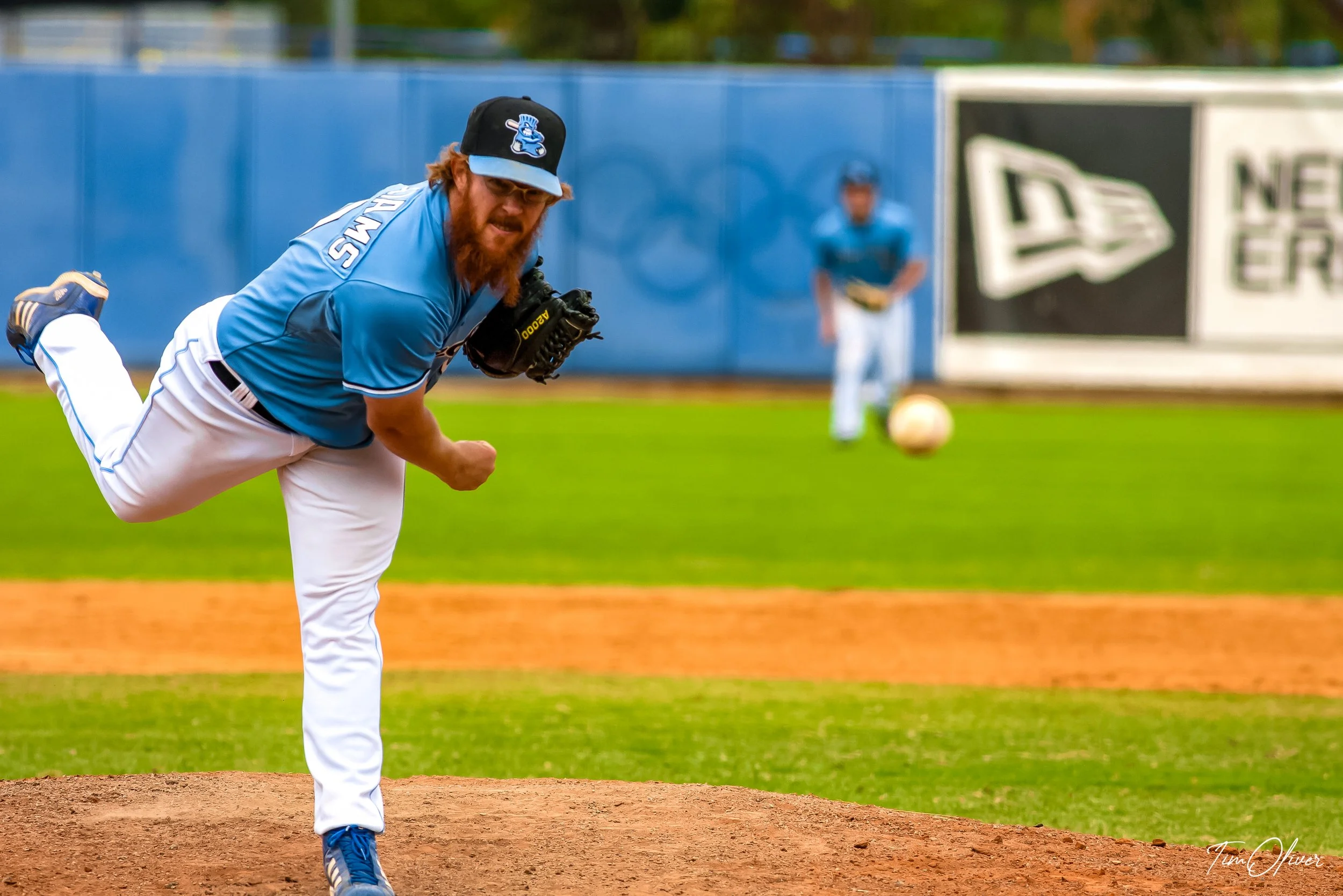 Sydney Blue Sox baseball team pitcher throwing down the line