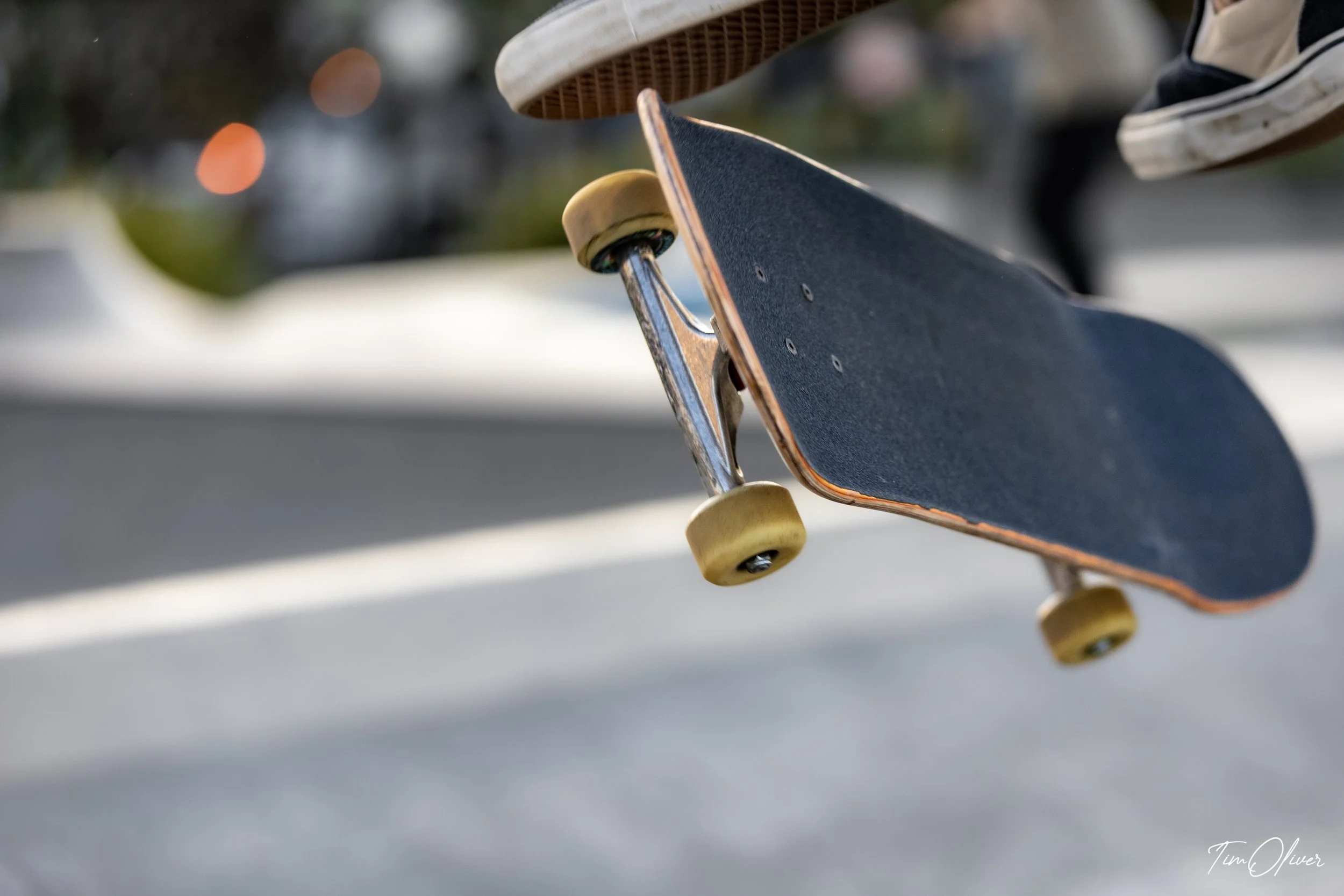 close up of a skateboarder doing a kickflip