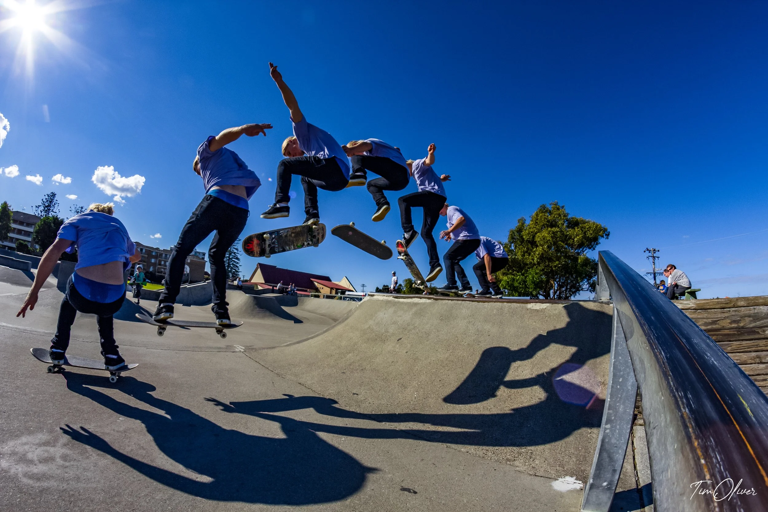 Sequence shot of Ben Hoar kick flipping off a quarter at Tuncurry skate park