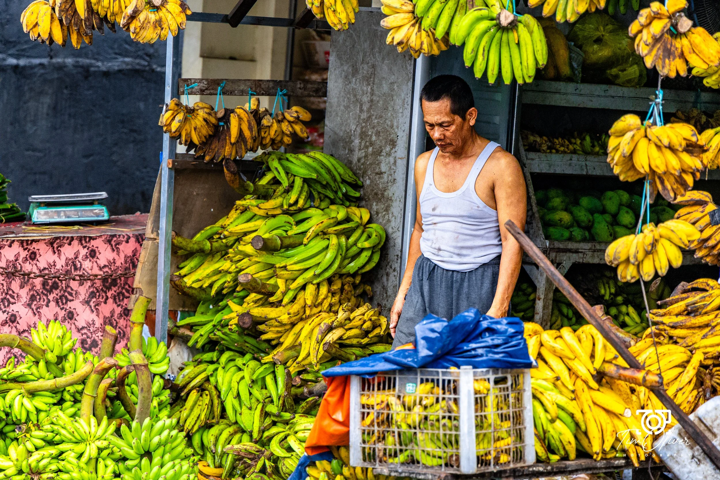 Banana stall owner in Bali