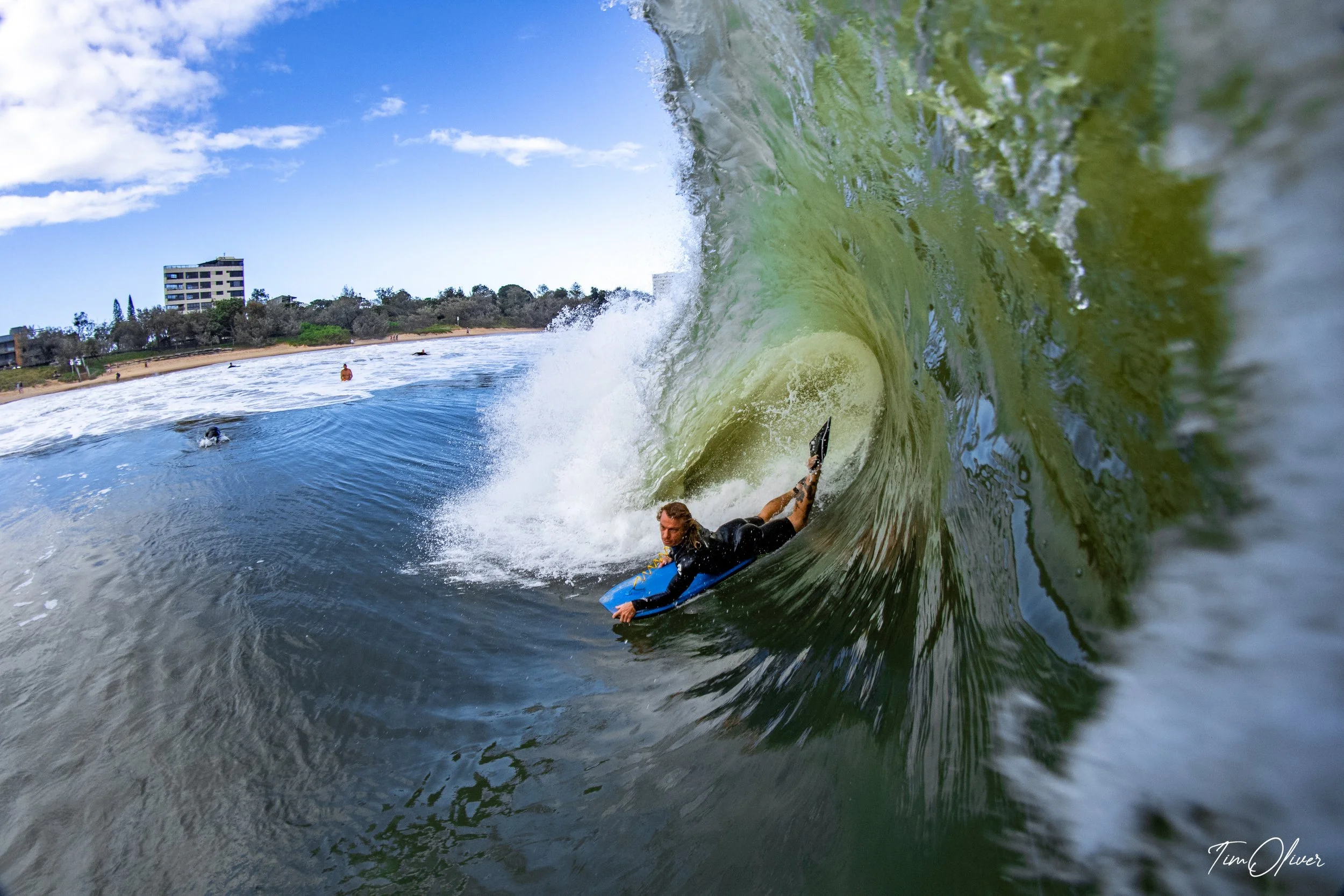 bodyboarder takes on huge waves at Mooloolaba in Australia.